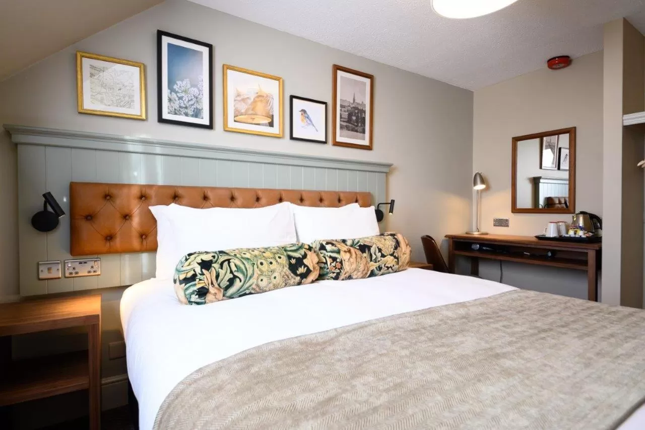 Bed in The St George and Dragon by Innkeeper's Collection