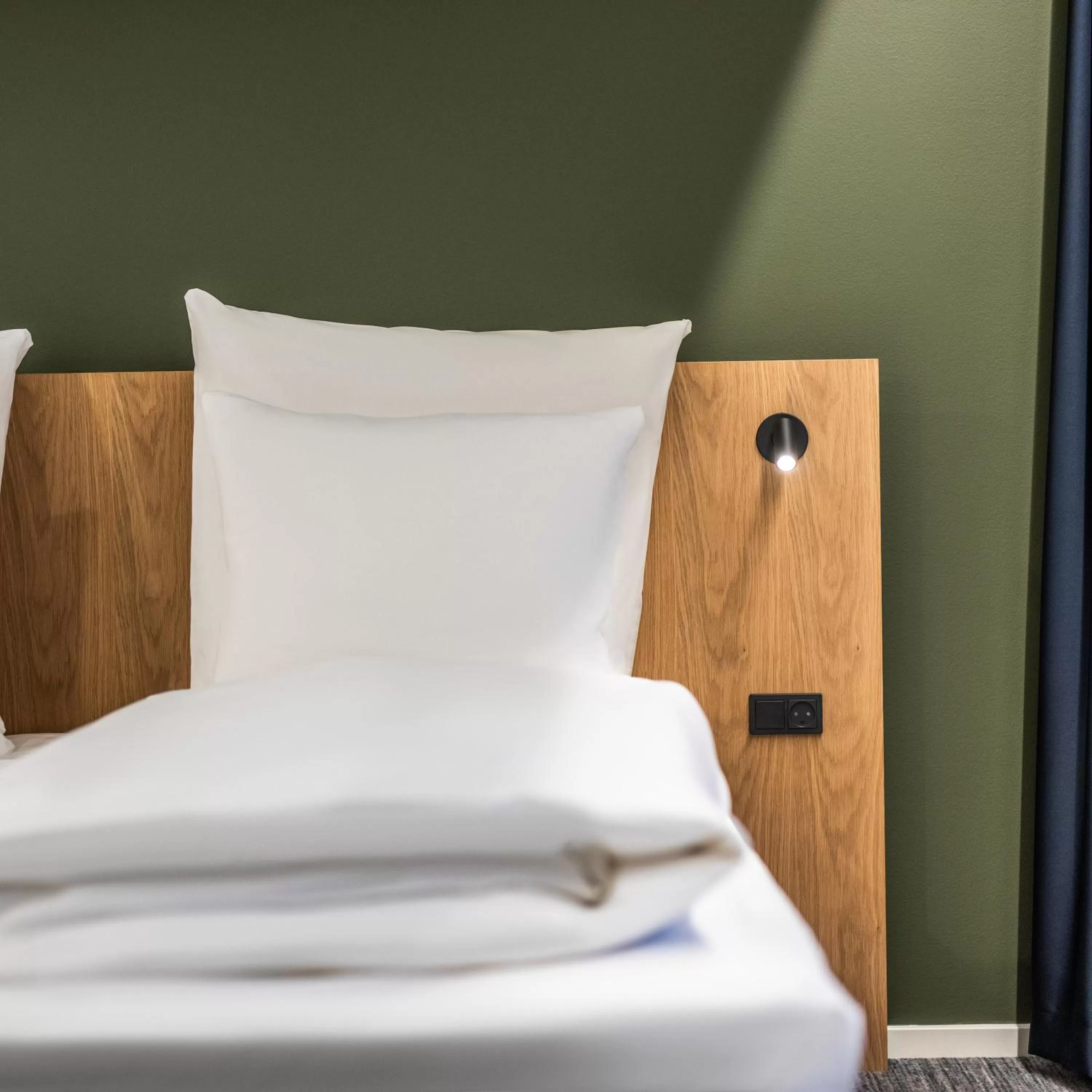 Bed in Comwell Copenhagen Portside Dolce by Wyndham