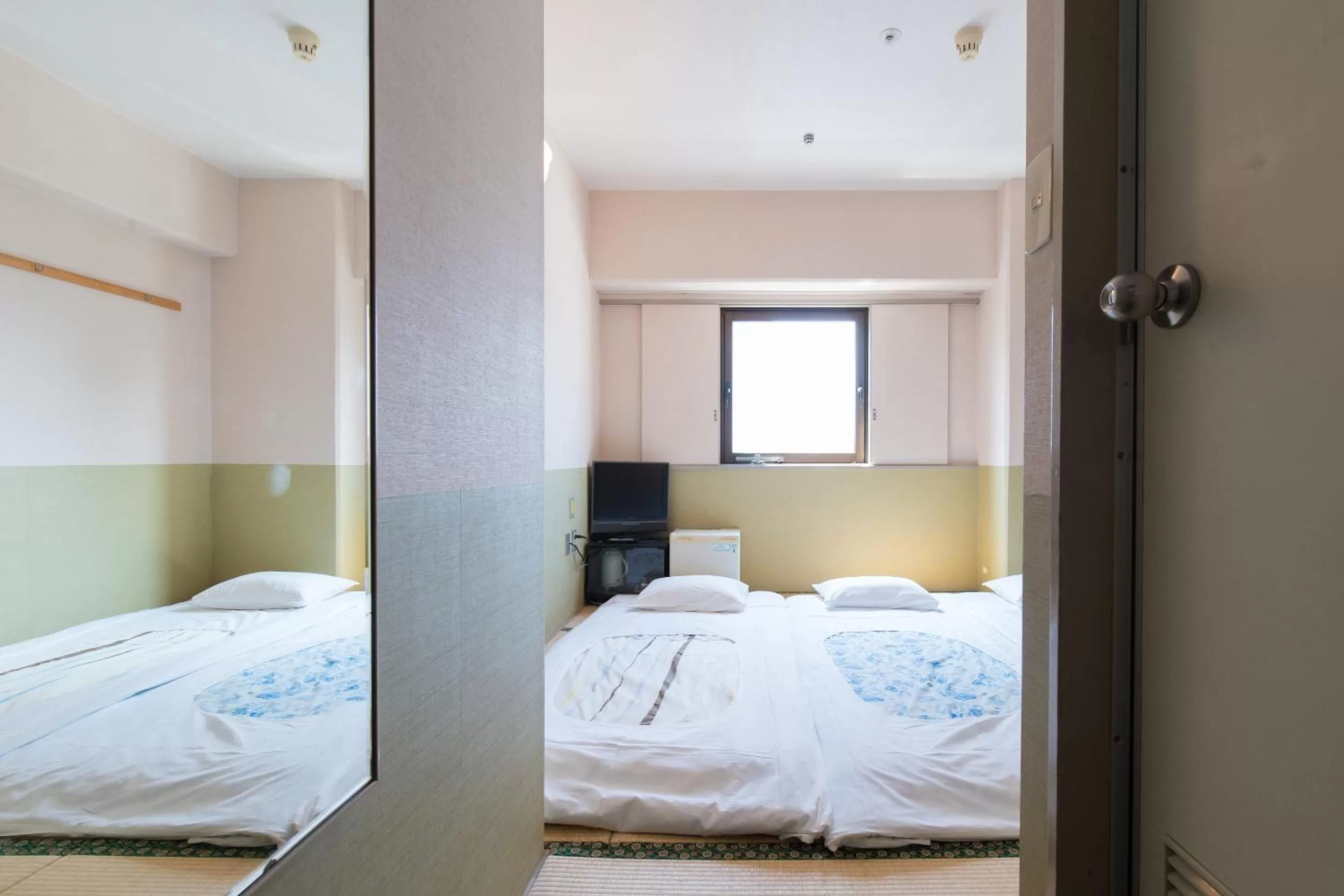 Photo of the whole room, Bed in Tabist Hotel Tetora Kitakyushu