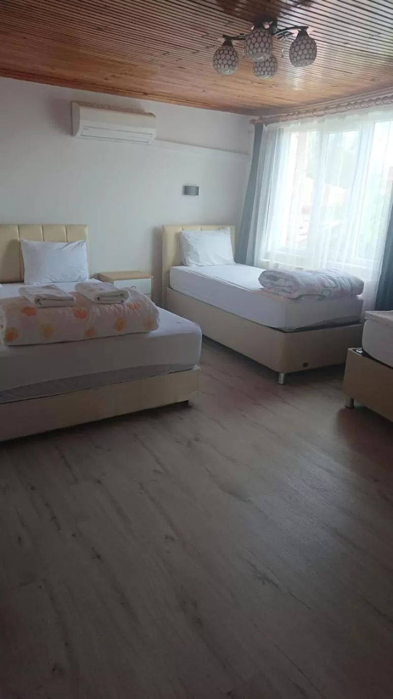 Bed in Ali's Pension