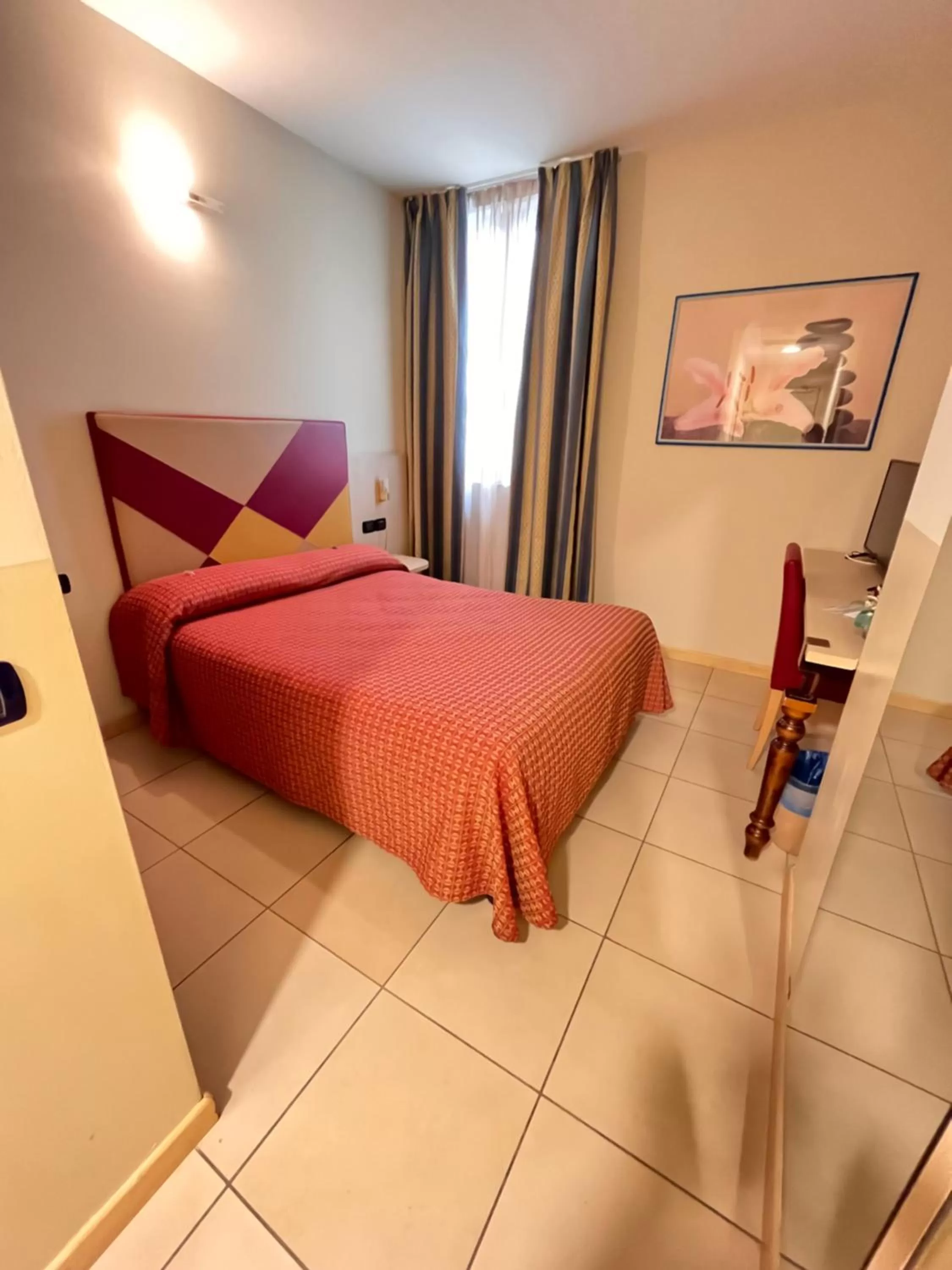 Bed in Hotel Lovere Resort & Spa