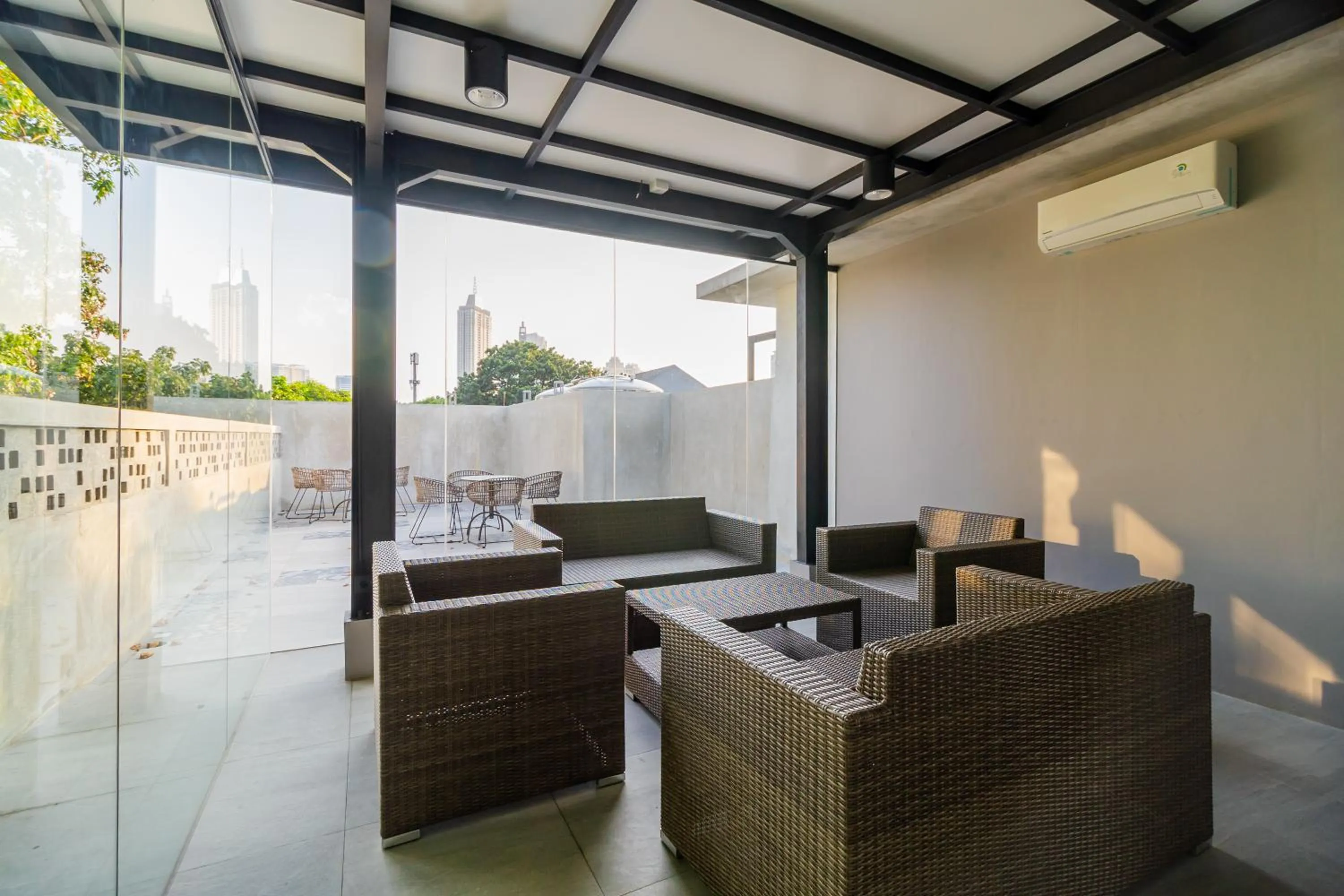 Seating area in RedDoorz Plus near Senayan City