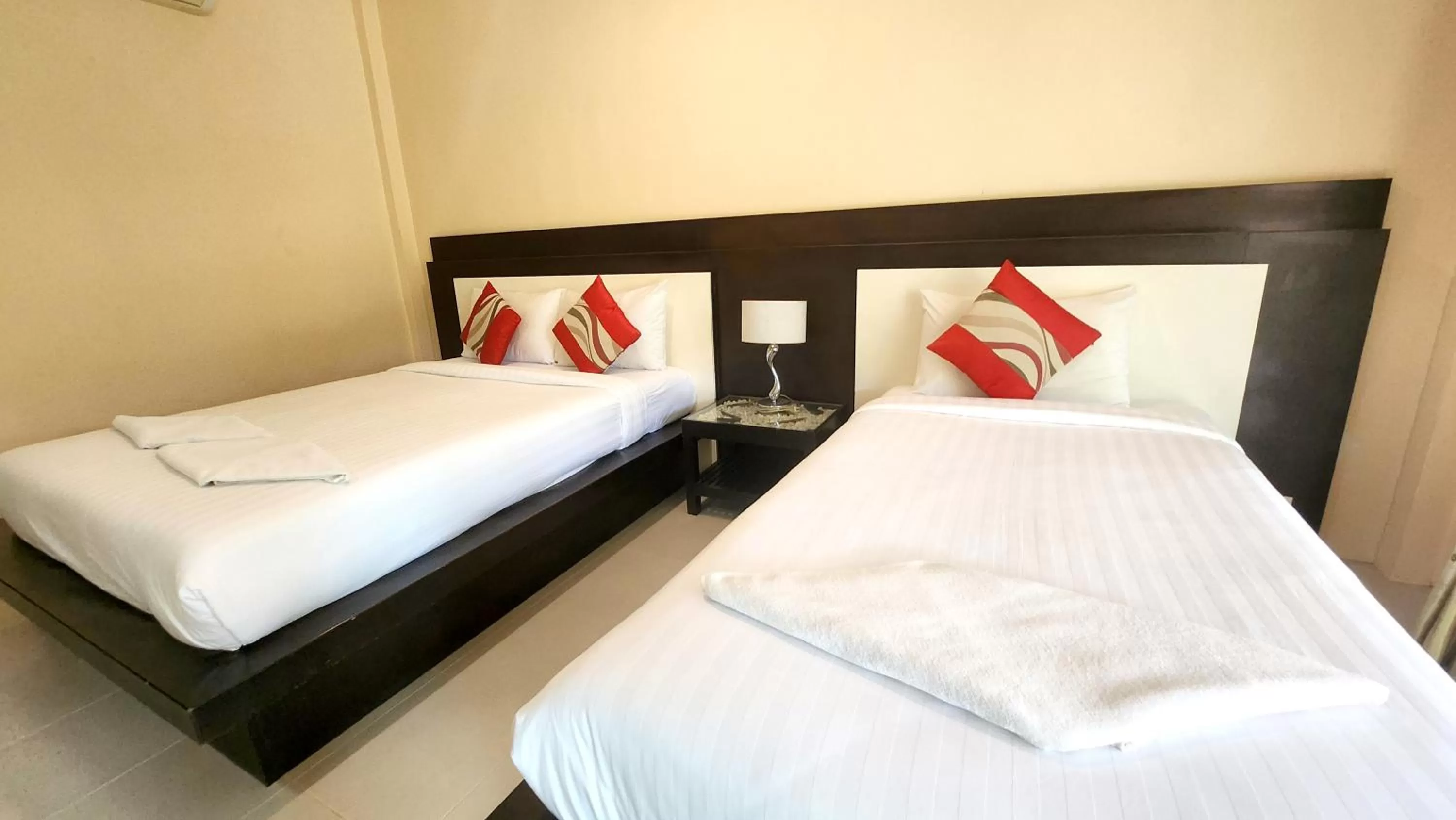 Bed in Sawaddee Aonang Resort