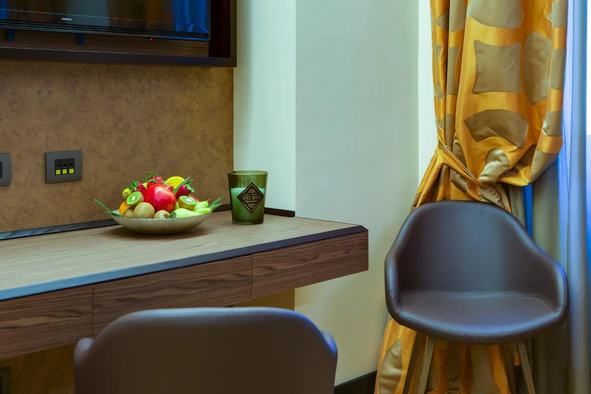 TV and multimedia in Solo Experience Hotel