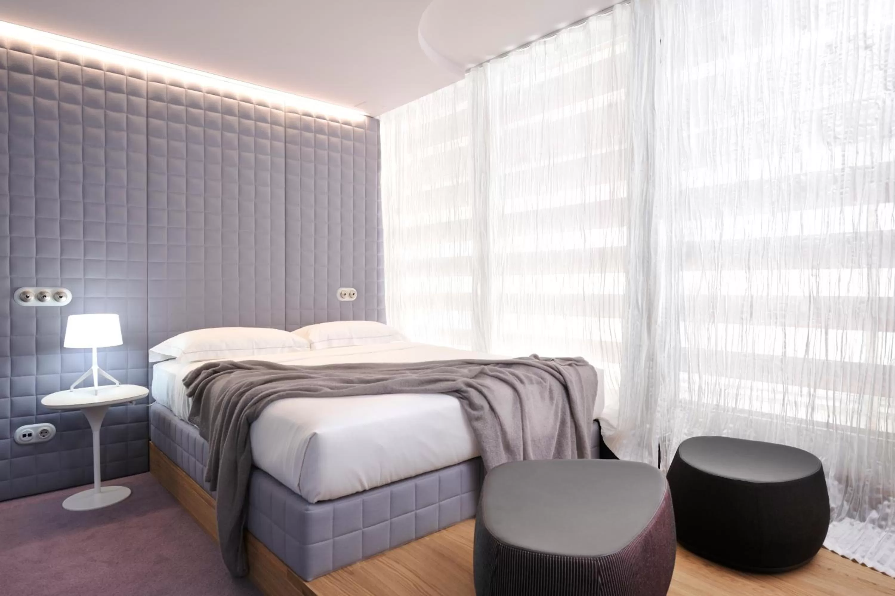 Bed in Vander Urbani Resort - a Member of Design Hotels