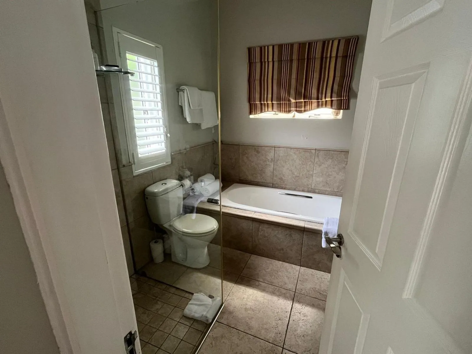 Toilet in Sandals Guest House