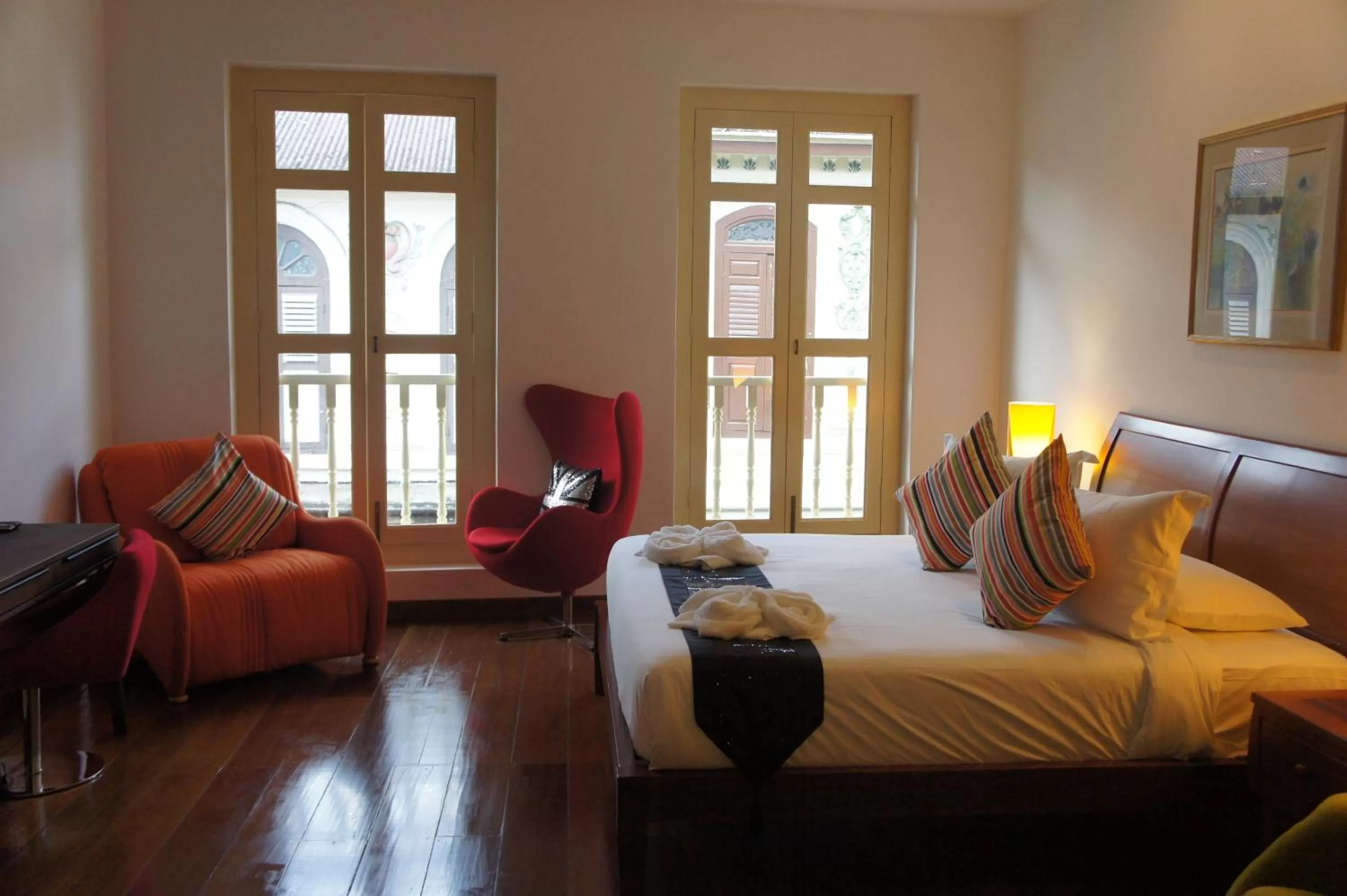 Bed in Heeren Palm Suites