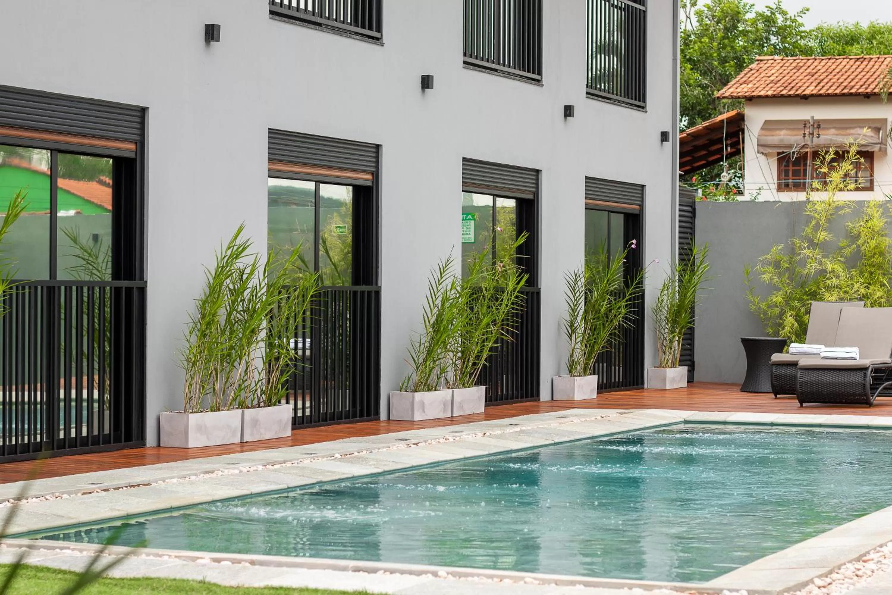 Property building, Swimming Pool in Pousada Flores do Carmo