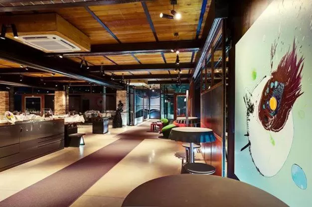 Communal lounge/ TV room in Il Tesoro Living Resort