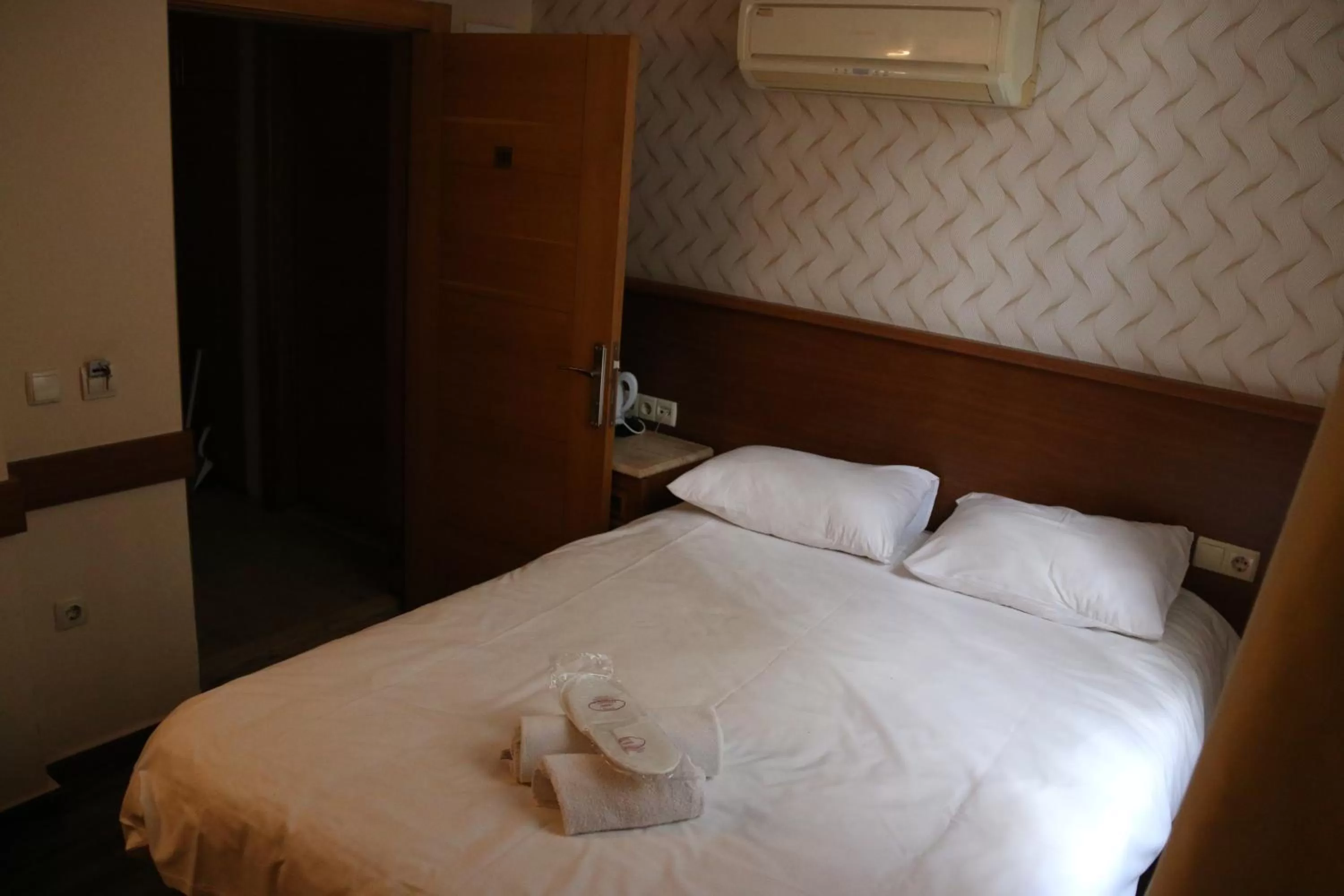 Bed in Grand Peninsula Hotel