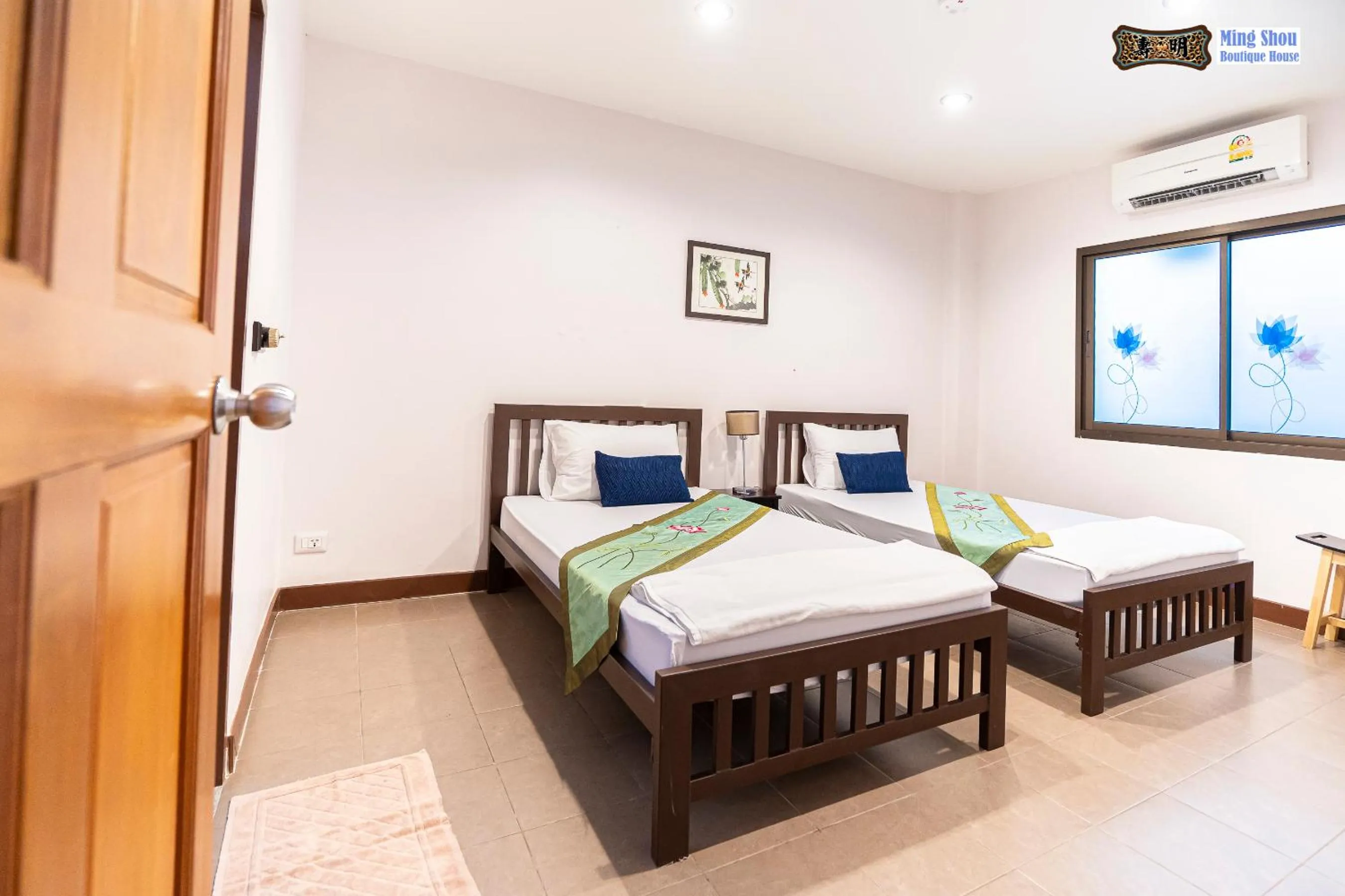 Bed in Ming Shou Boutique House