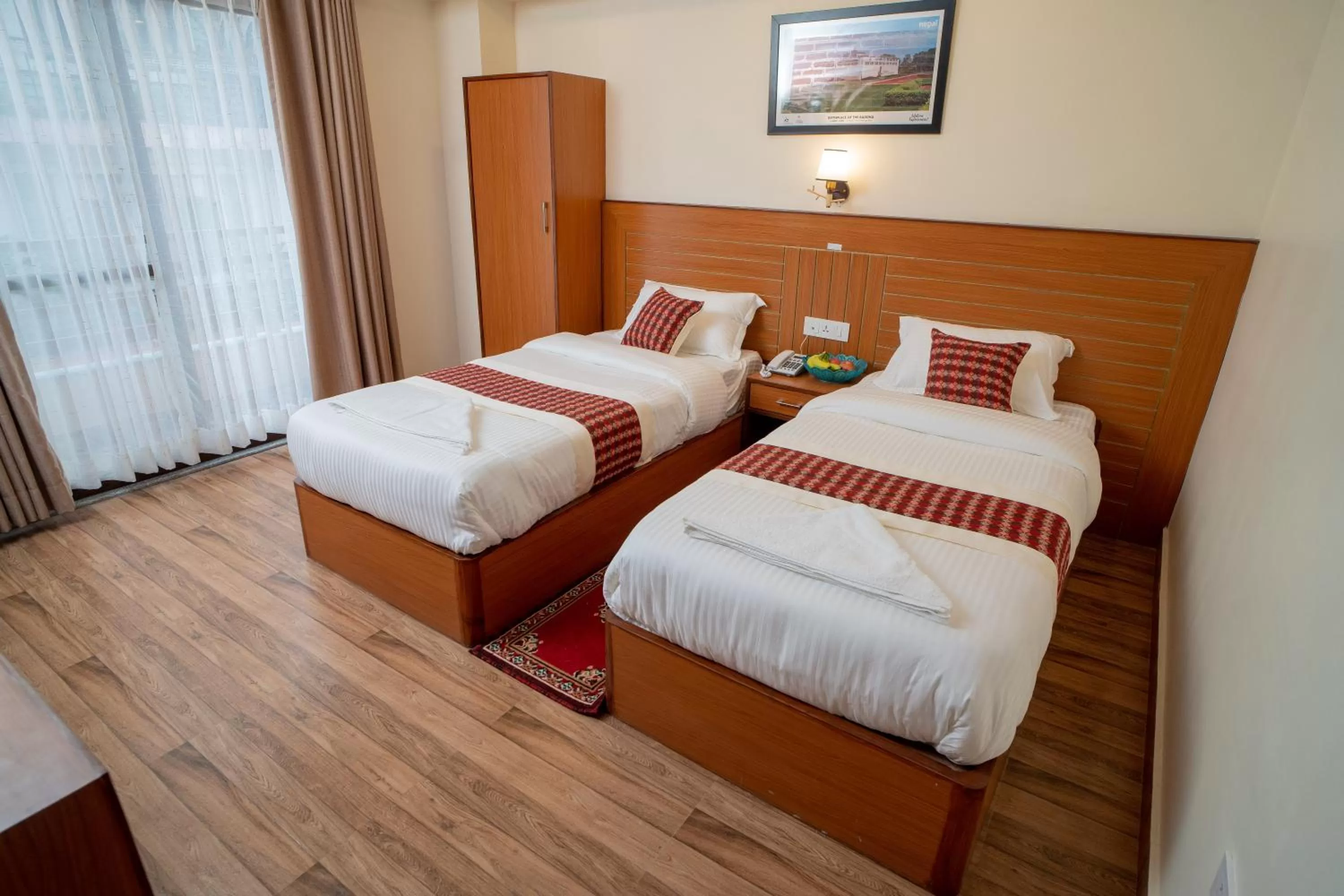 Bed in Madhuban Hotel