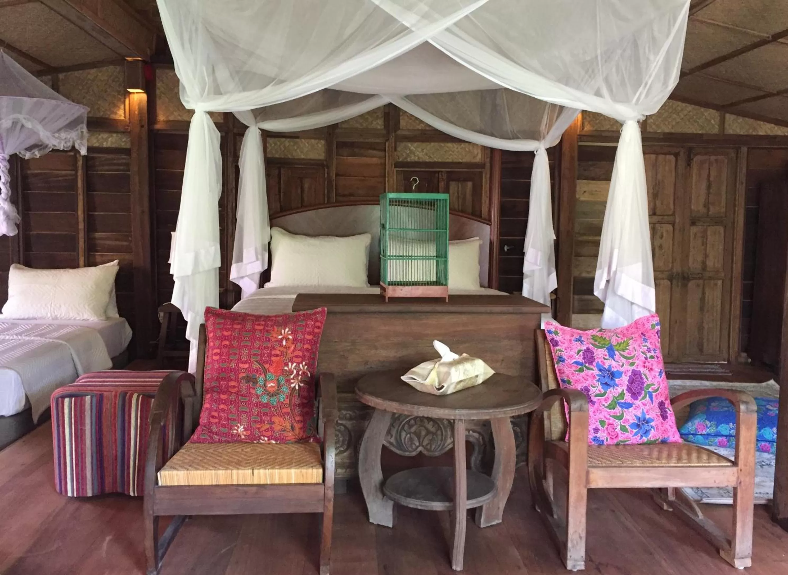 Bed in Kunang Kunang Heritage Villas