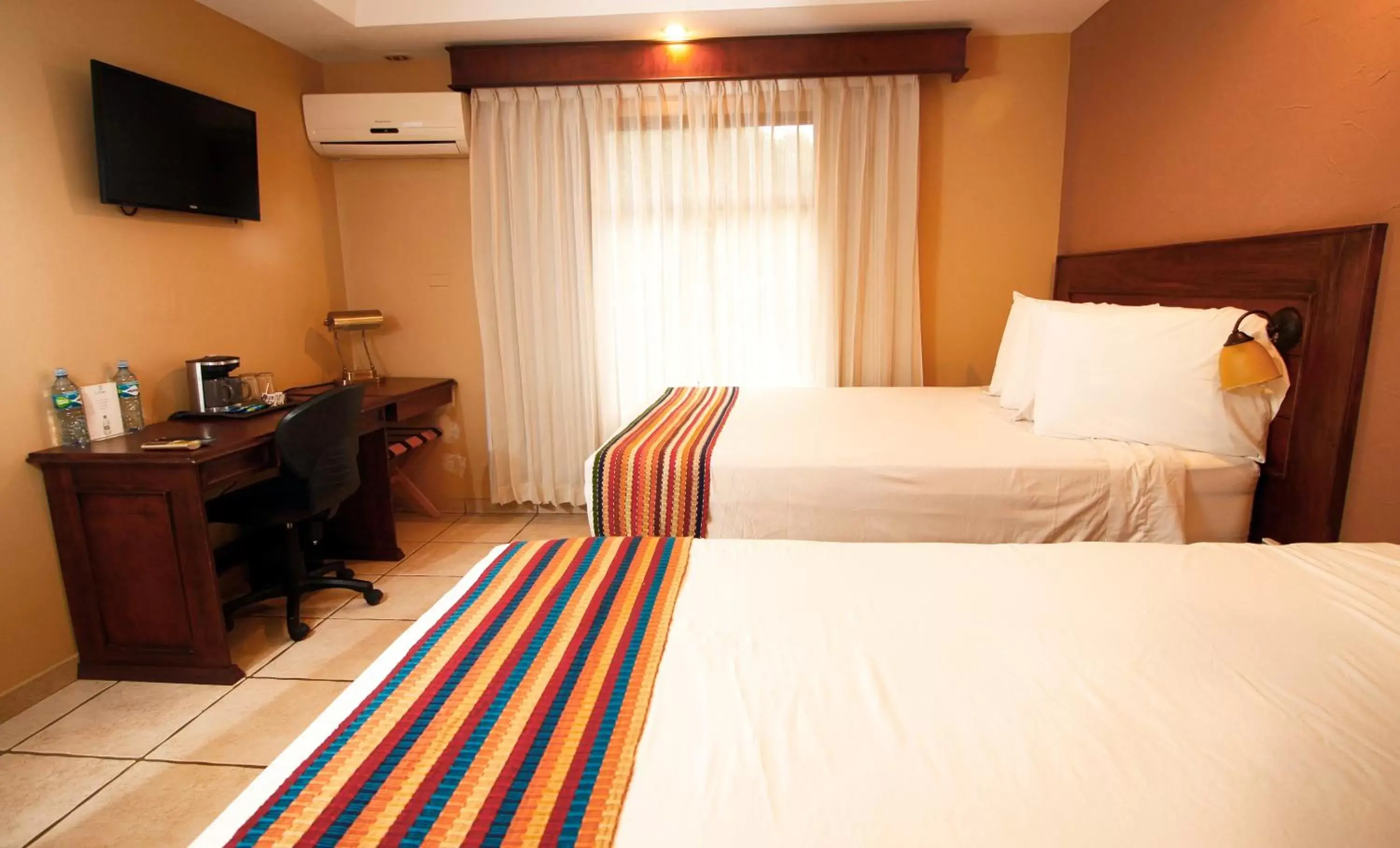 Standard Double Room with Two Double Beds in La Riviera Hotel Standard Double Room with Two Double Beds in La Riviera Hotel