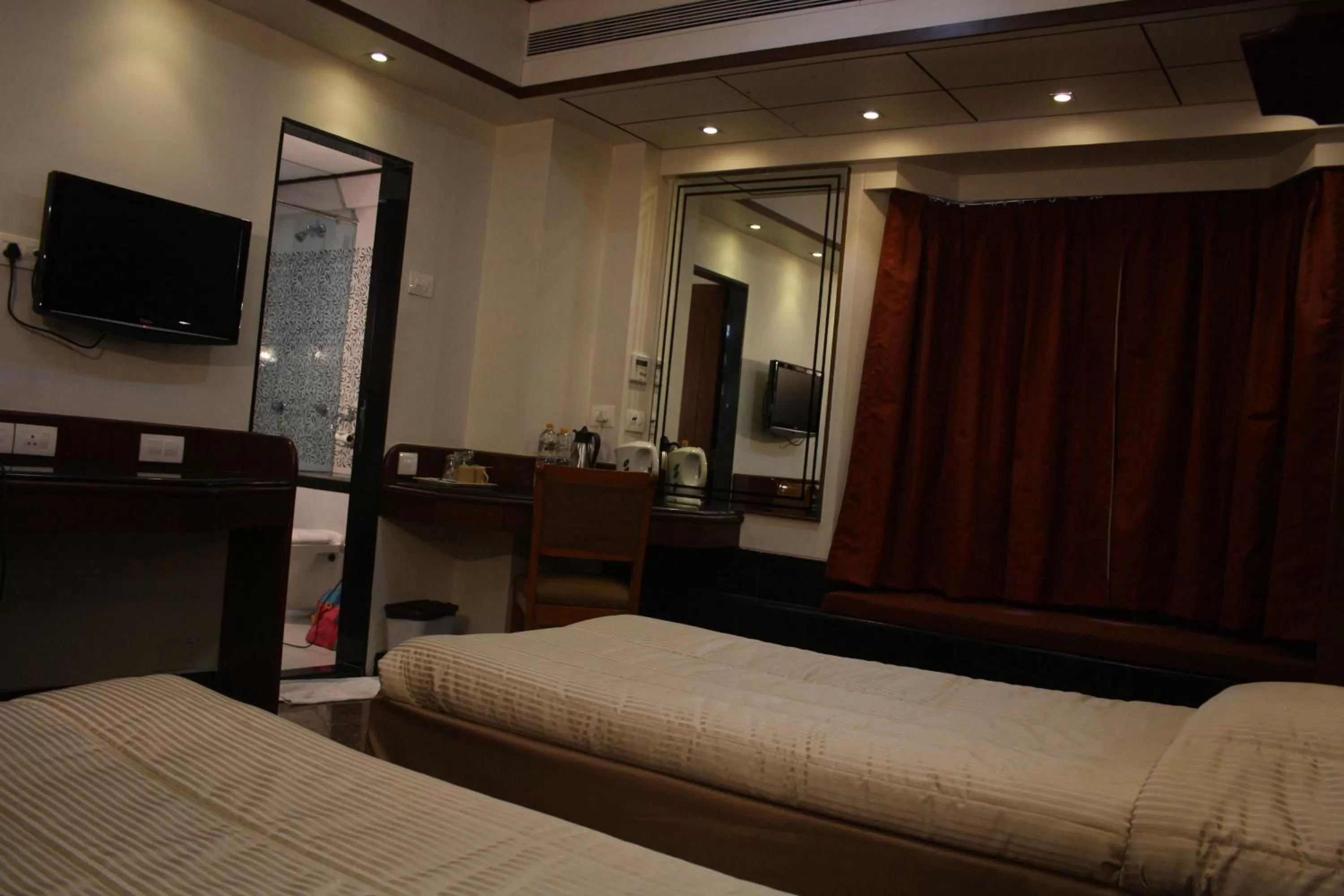 Photo of the whole room, Bed in Hotel Karl Residency