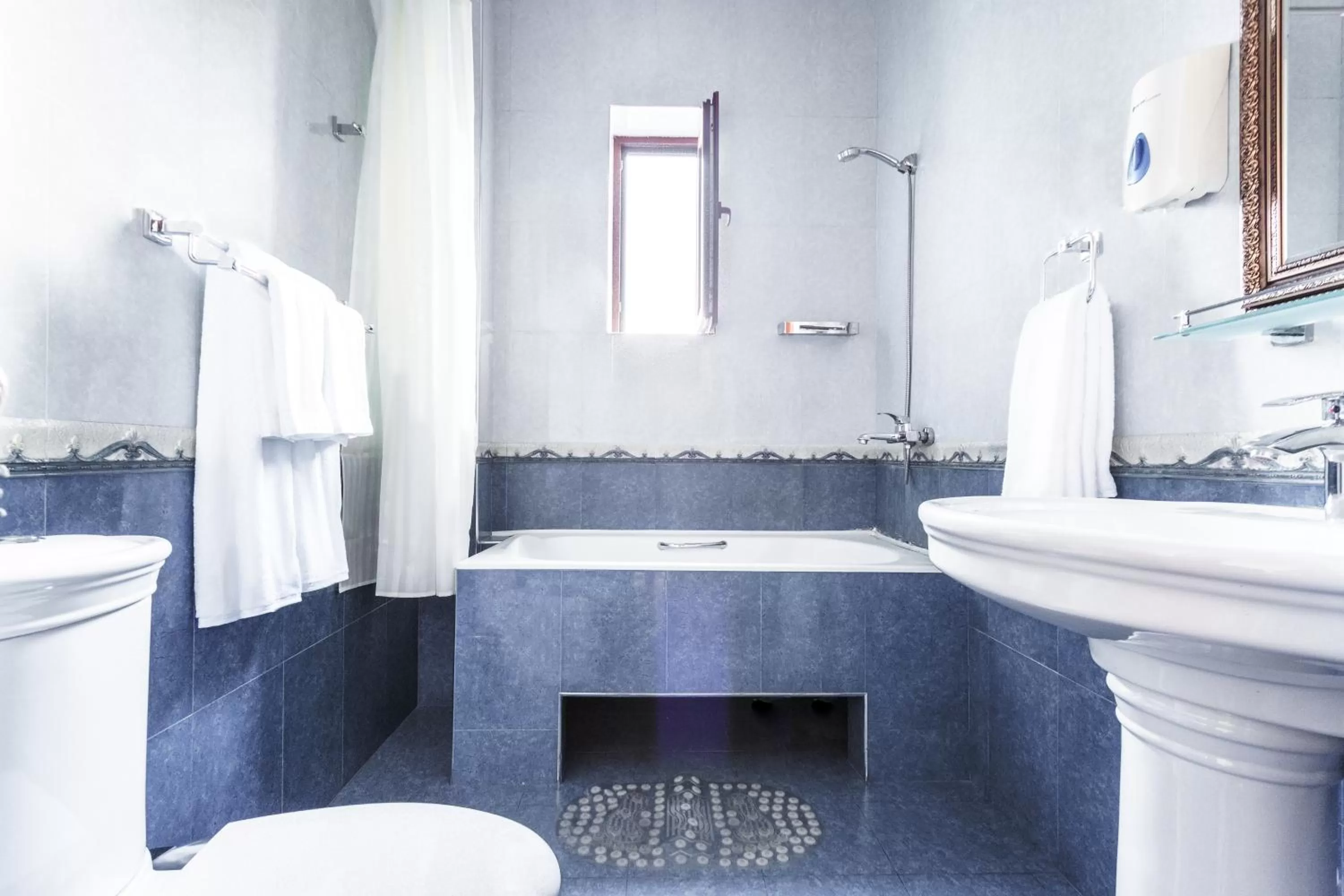 Bathroom in Western Suites Hotel