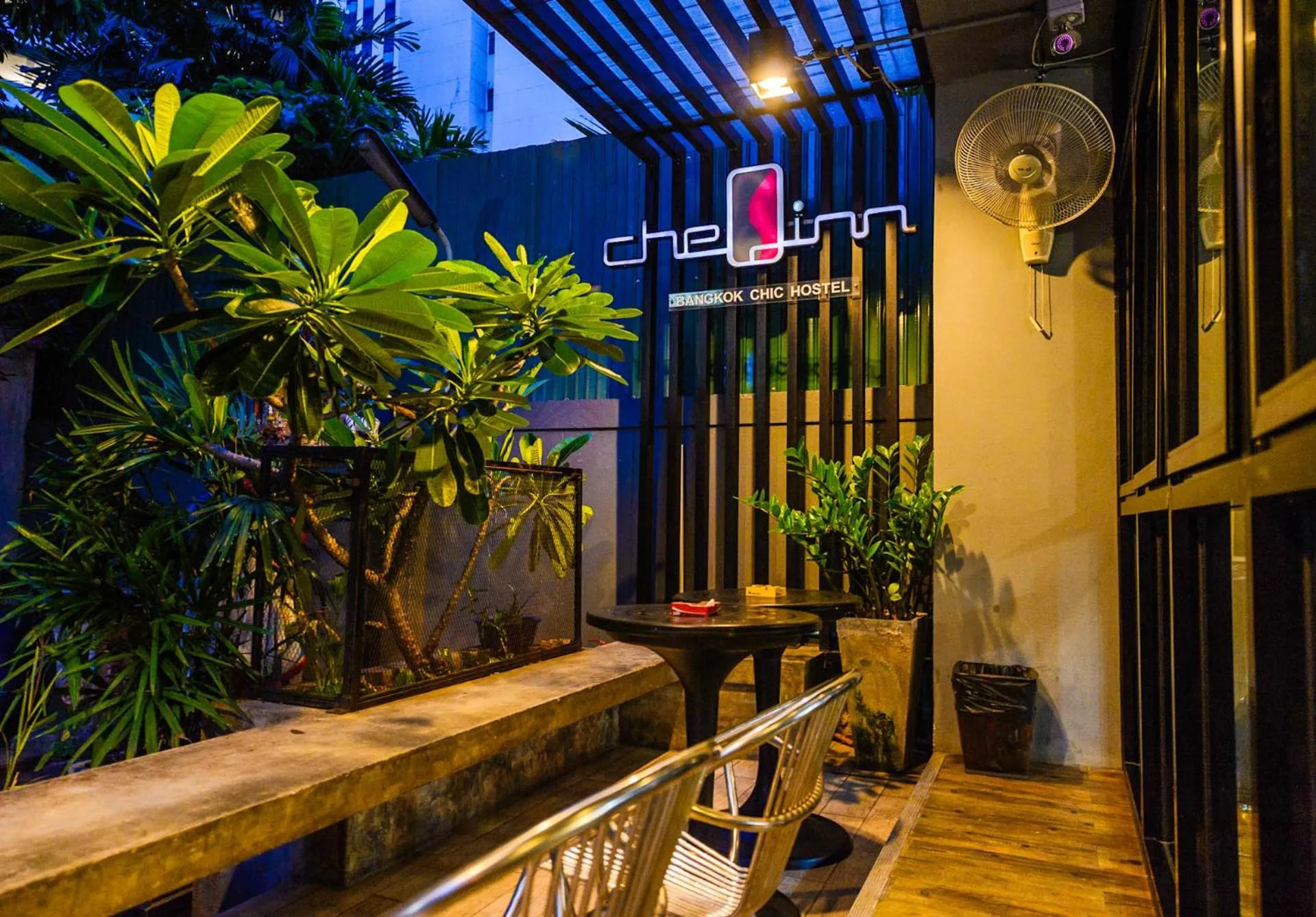 Property logo or sign in CheQinn Hostel - Sukhumvit 4 Nana Plaza