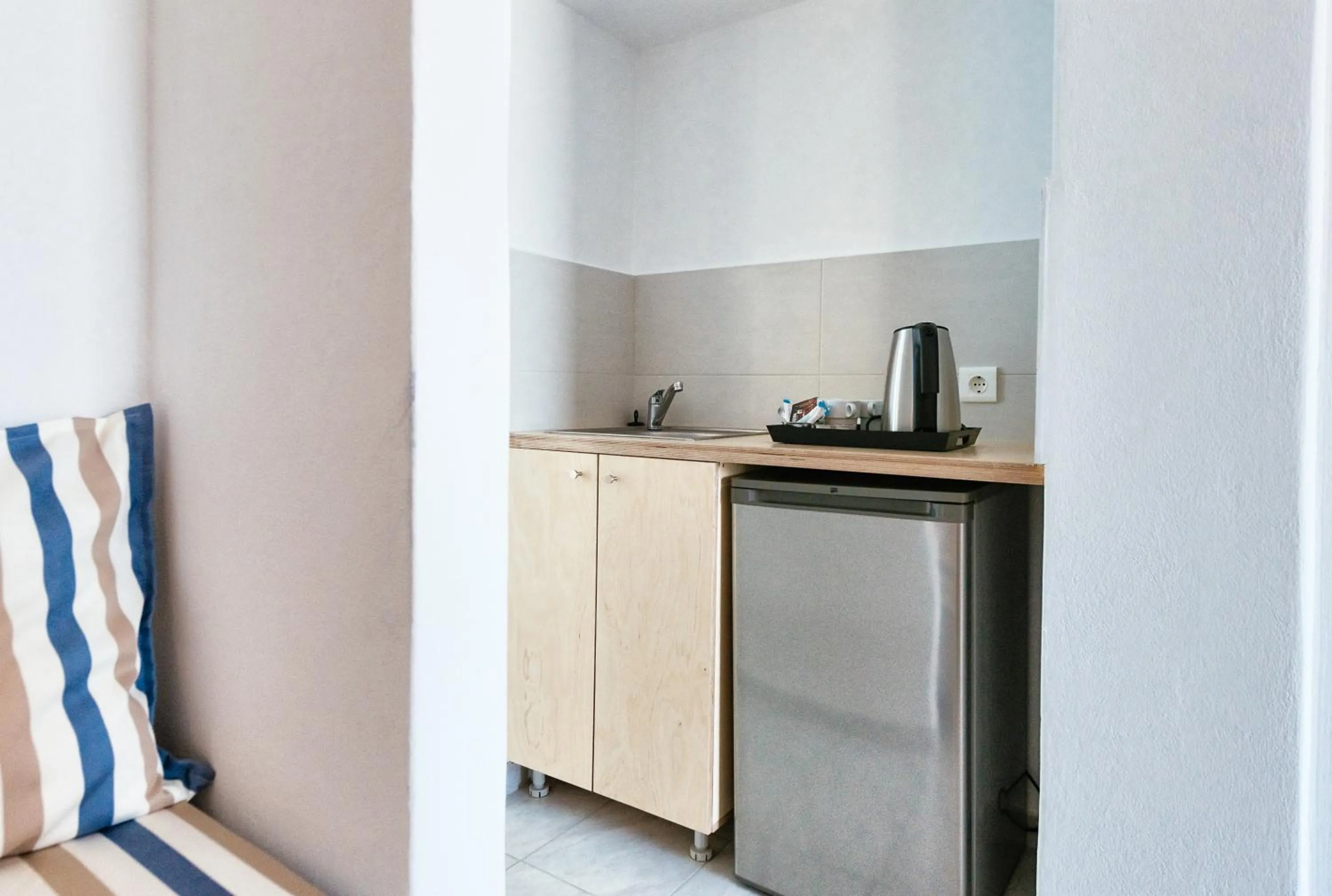 Kitchen or kitchenette in Elounda Krini Hotel