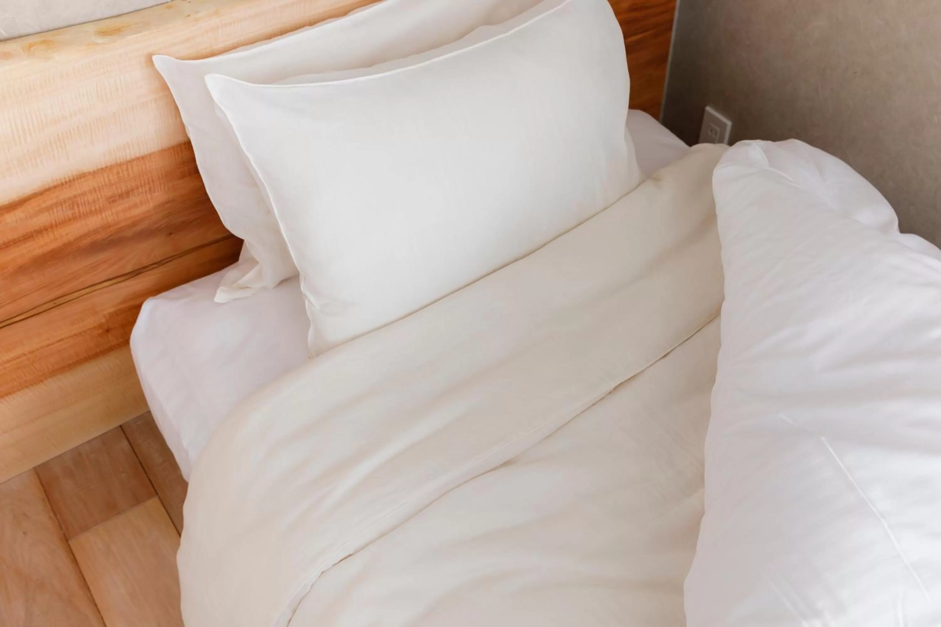 Bed in ひがし茶屋街らしく金沢 Hotel Rashiku kanazawa