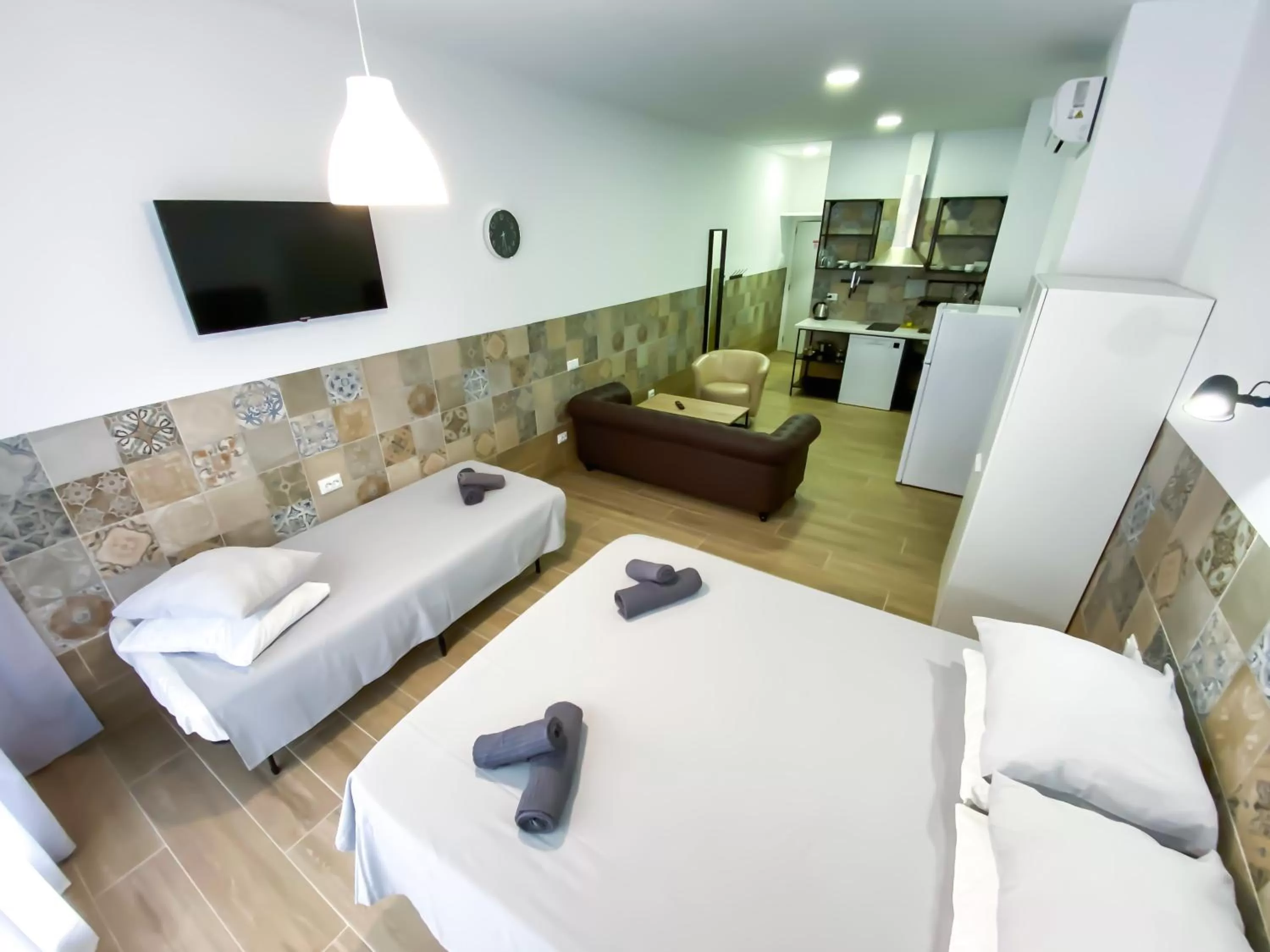 Seating area, Bed in Hotel Apartamentos Pueblo Mar