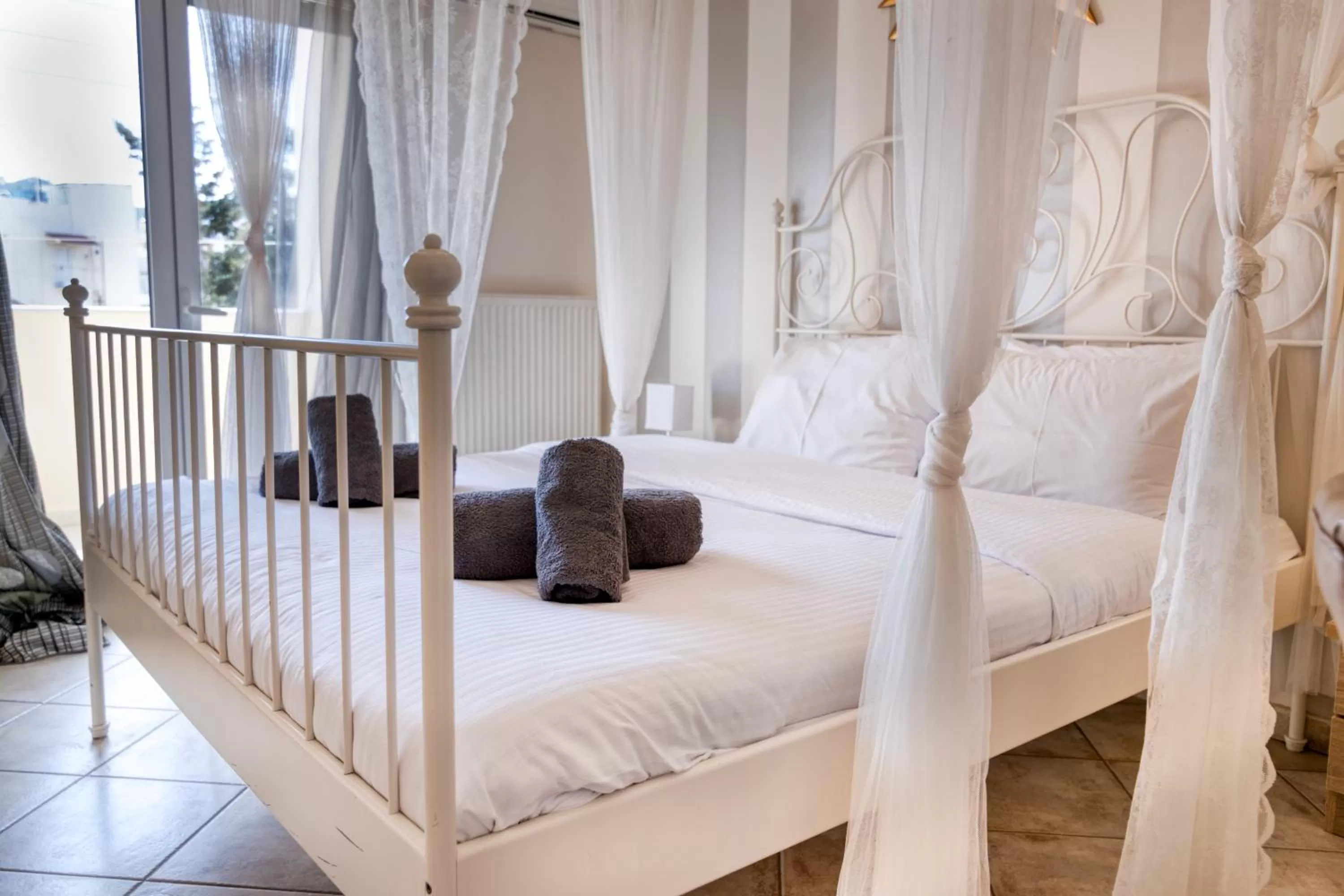 Bed in Votsalakia Hotel & Luxury Apartments