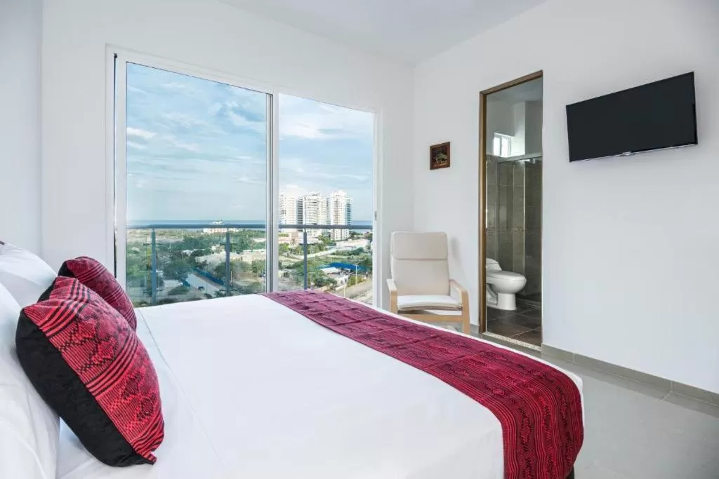 Bed in Terrazas Tayrona Travelers Apartamentos y Suites