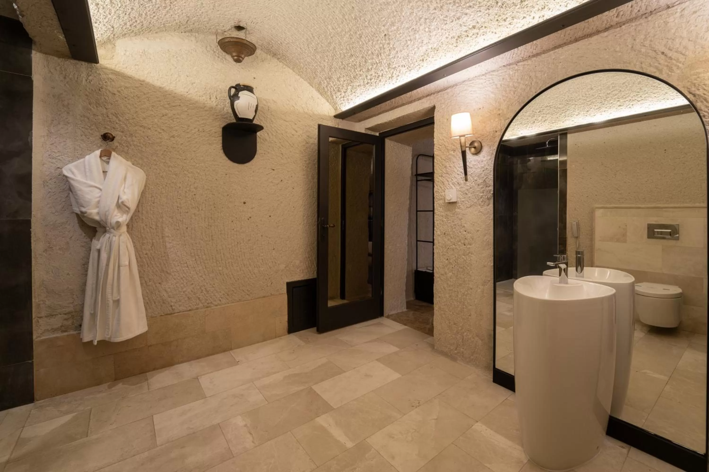 Bathroom in Artemis Cave Suites & Spa- Adults Only