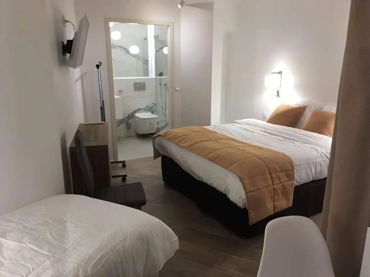 Toilet, Bed in Hotel Ferney République