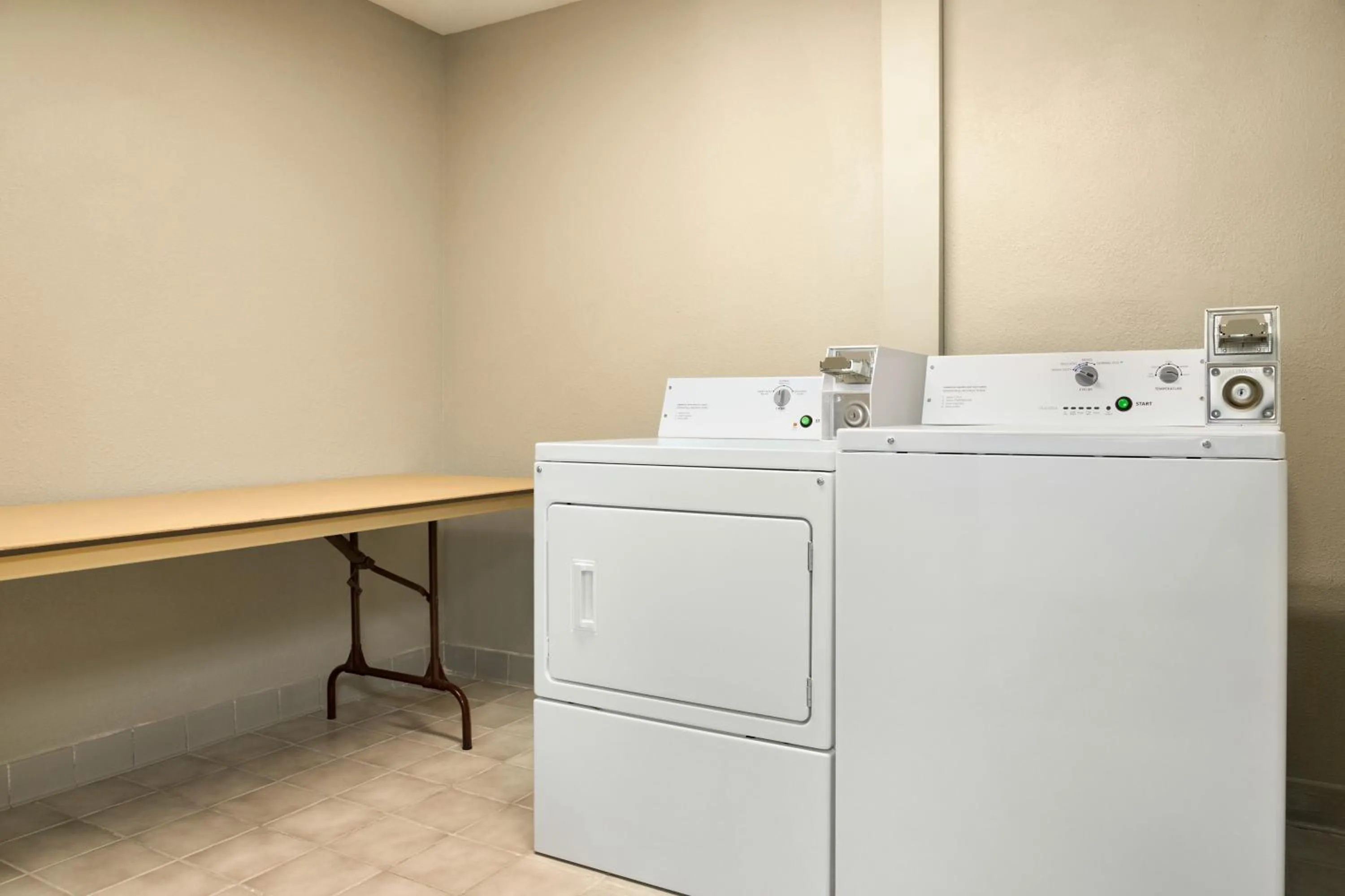 washing machine in Baymont by Wyndham Blackwell I-35