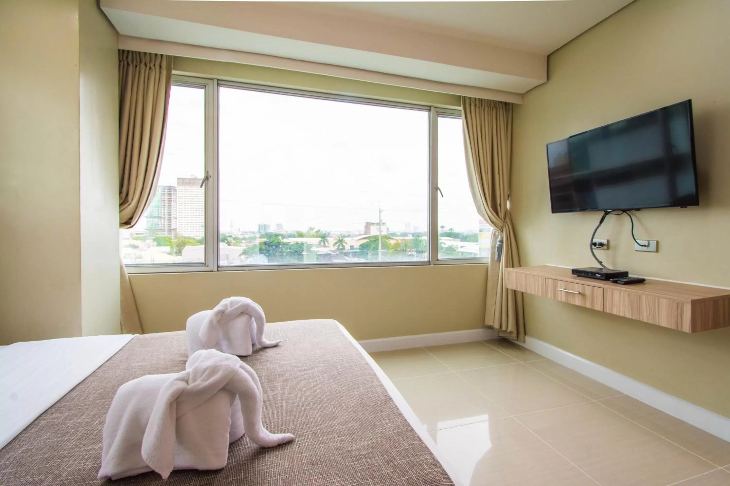 Bed in Alicia Apartelle