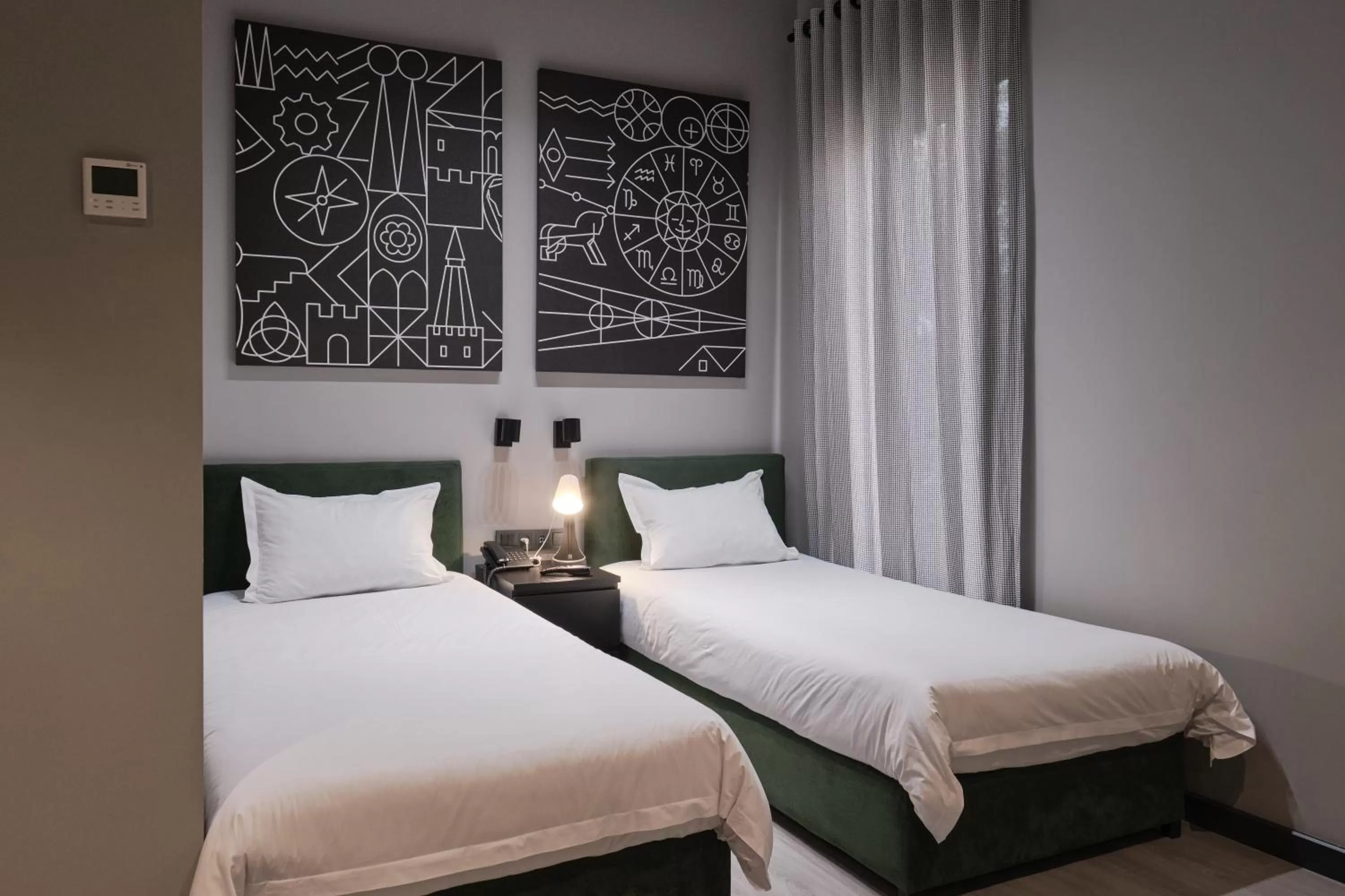 Bed in Sapiens Hotel