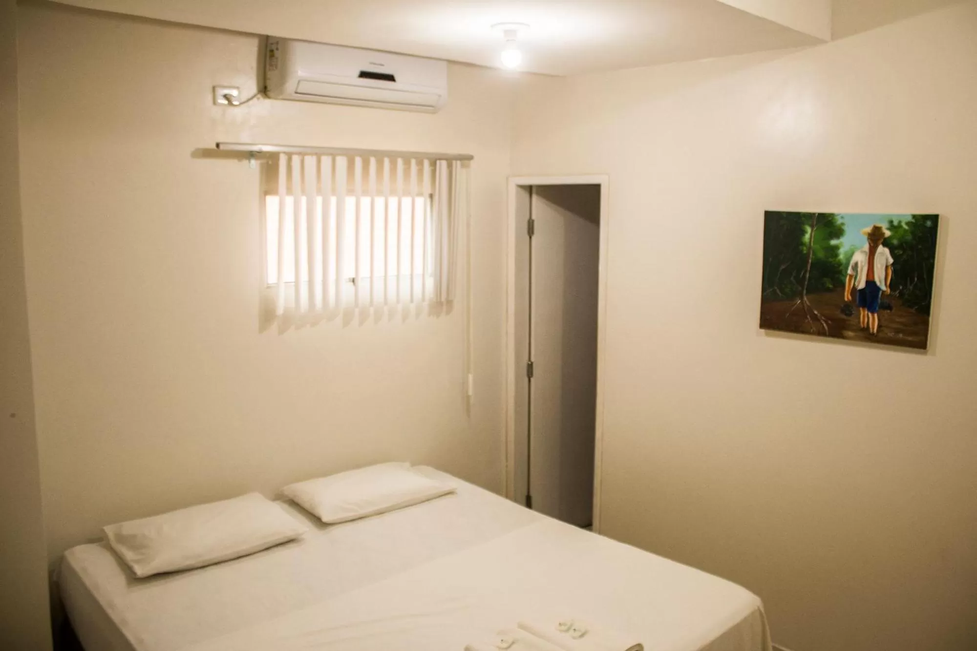 Bed in Pousada Vila do Carmo