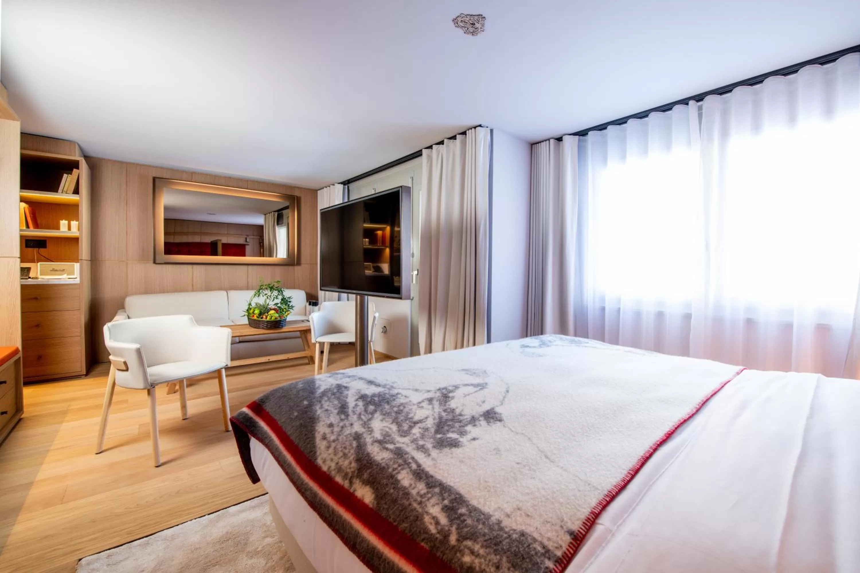 Bed in Schweizerhof Zermatt - a Small Luxury Hotel