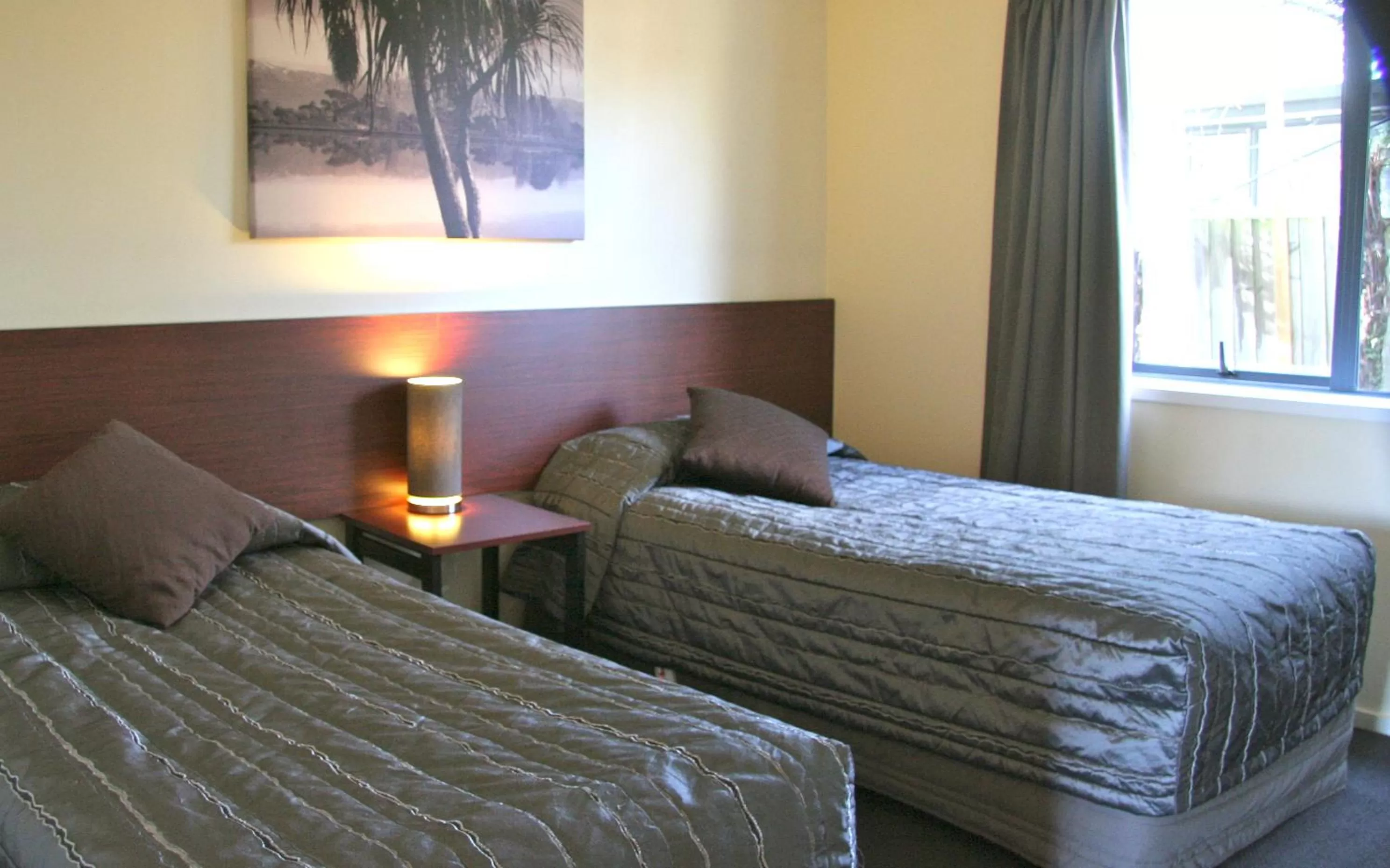 Bed in Sherborne Motor Lodge