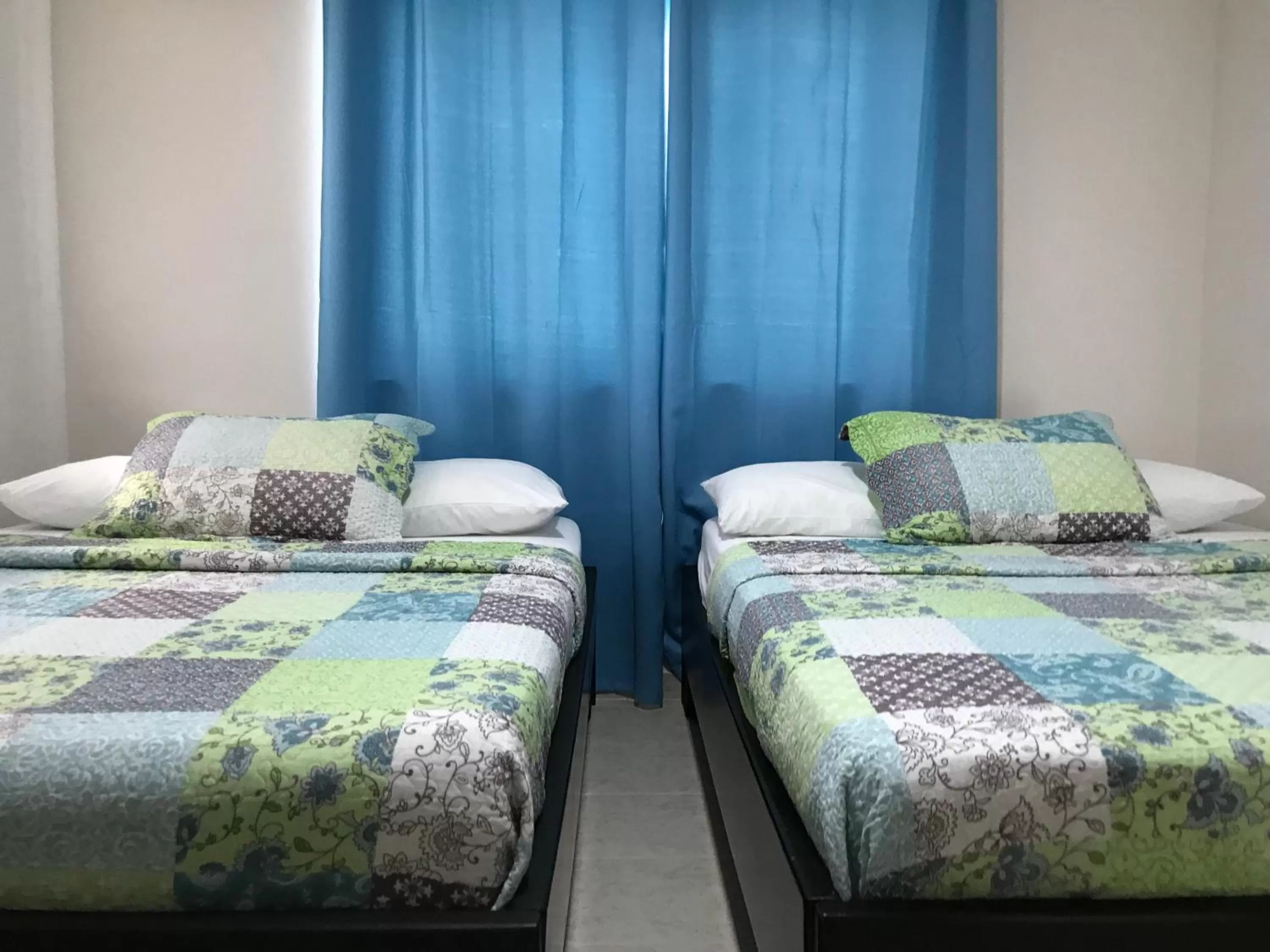 Bed in Caribbean Island Hotel Piso 2