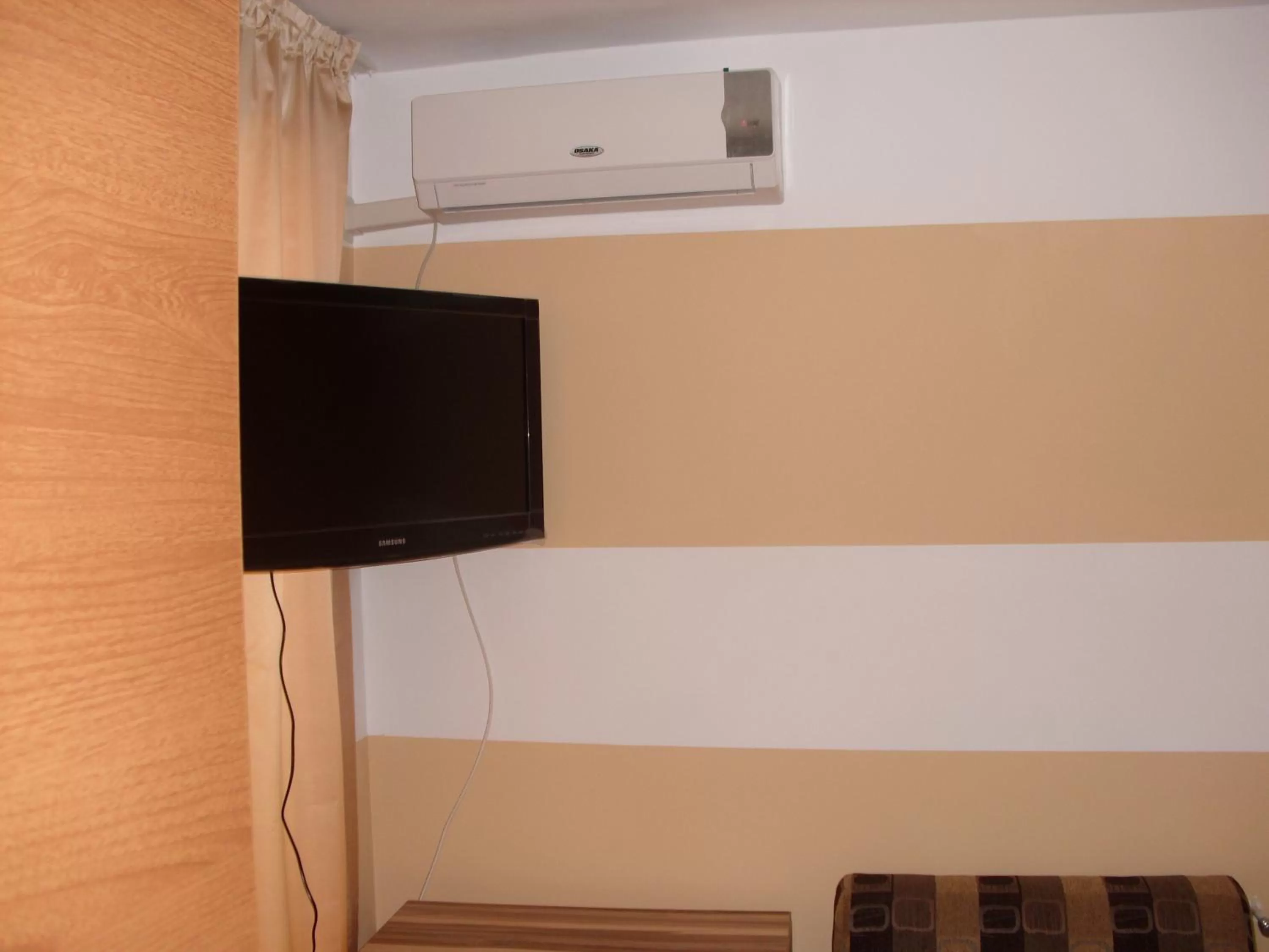 TV and multimedia, TV/Entertainment Center in Family Hotel Malibu