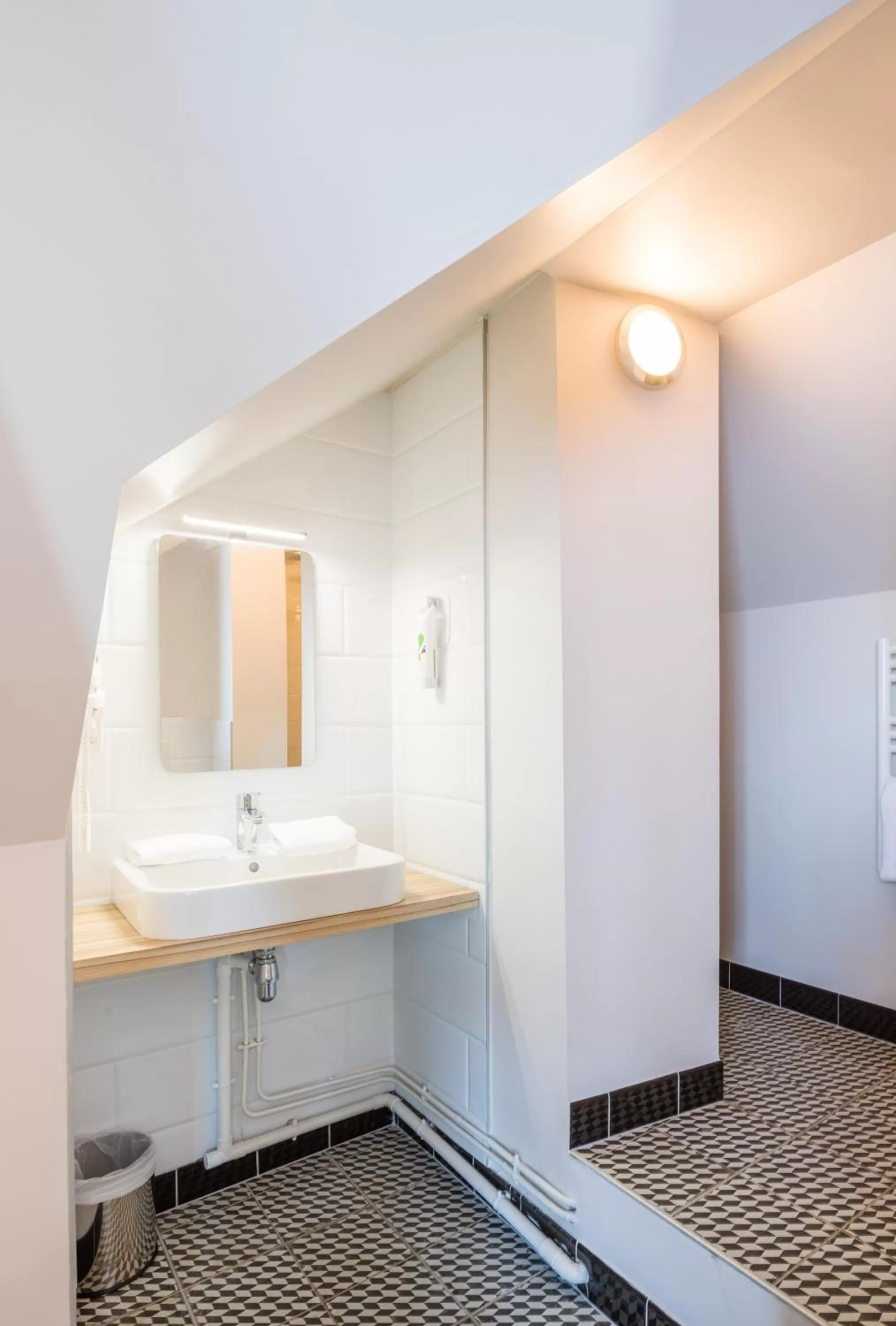 Bathroom in ibis Styles Laval Centre Gare