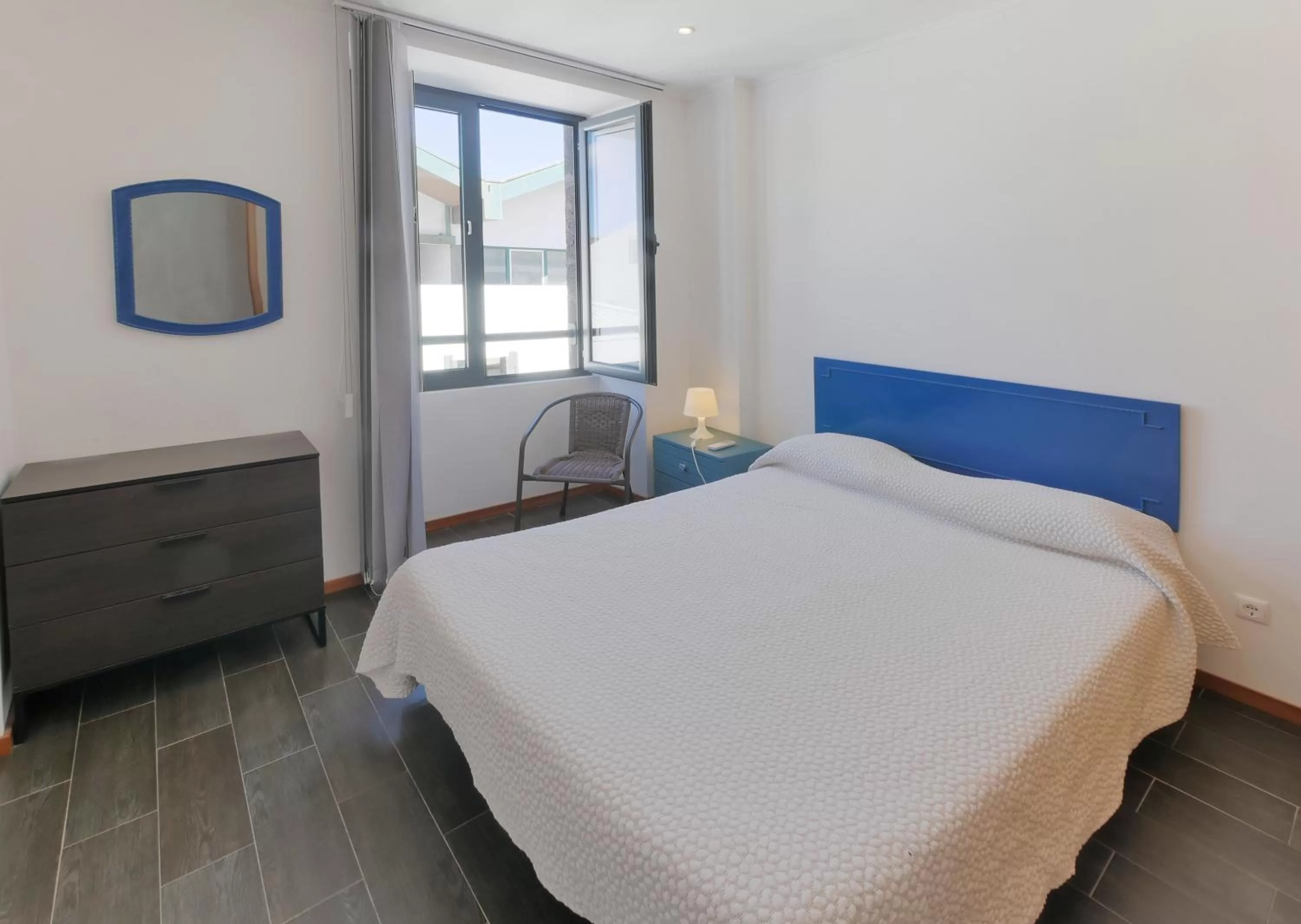 Bed in Faial Marina Apartments 1