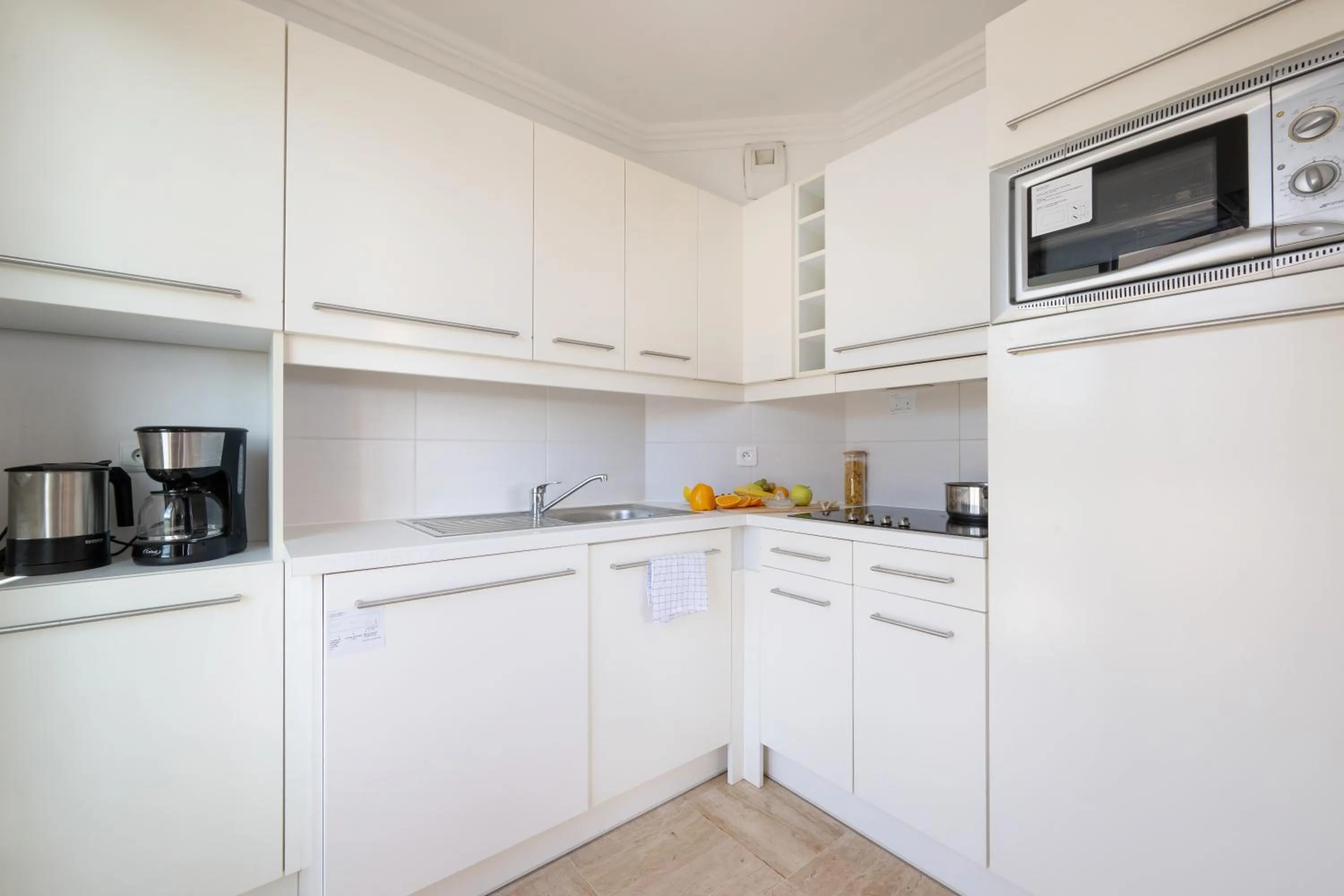Kitchen or kitchenette in Nemea Appart Hotel Le Lido Cagnes sur Mer