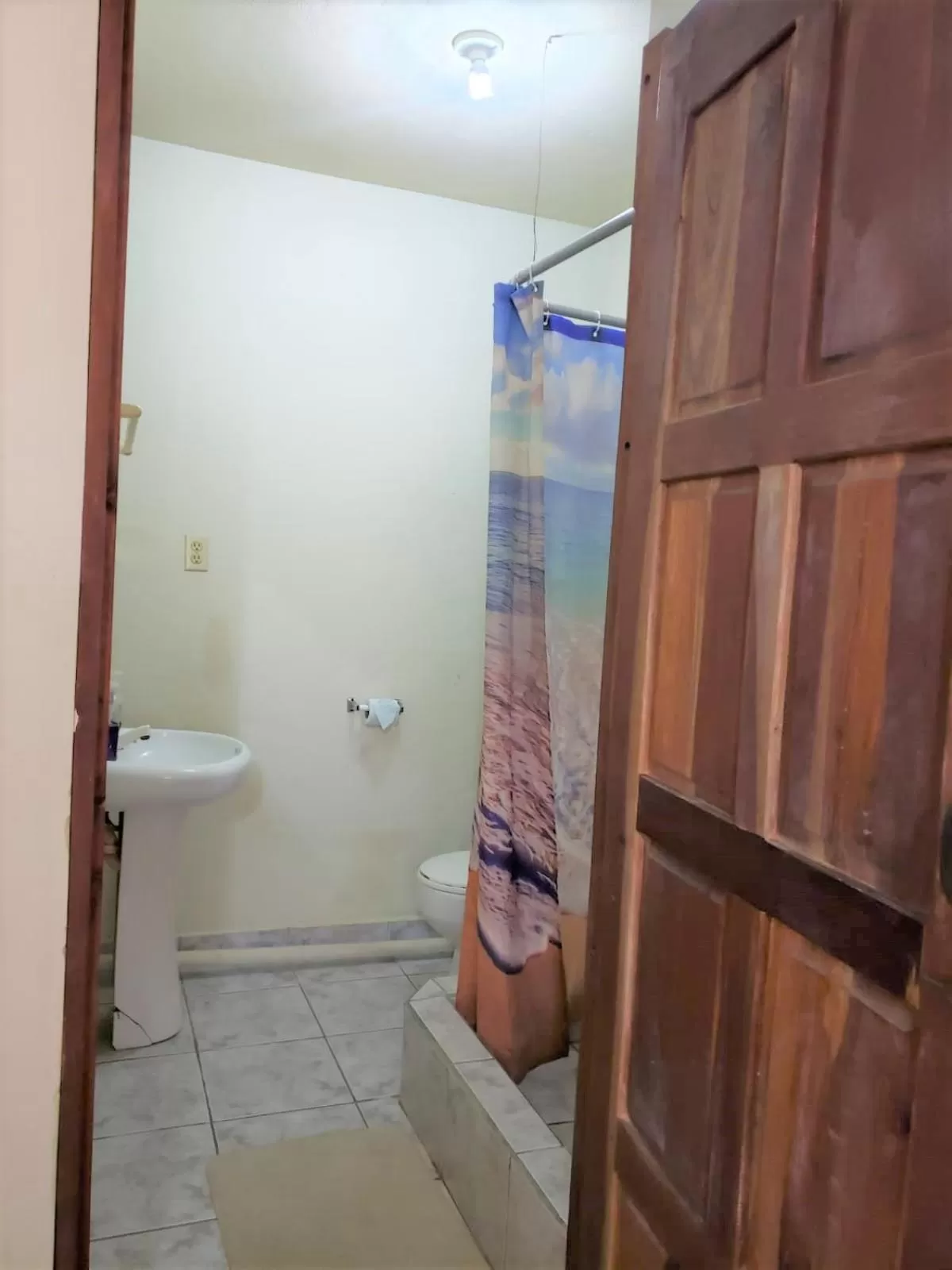 Bathroom in Beach Side Condos Caye Caulker by CCVH
