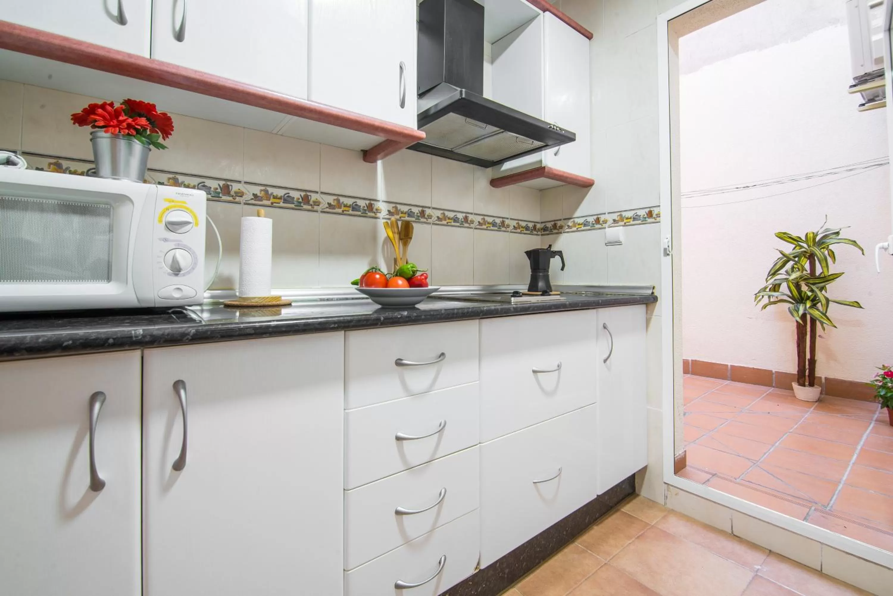 Kitchen or kitchenette in Apartamentos Granata