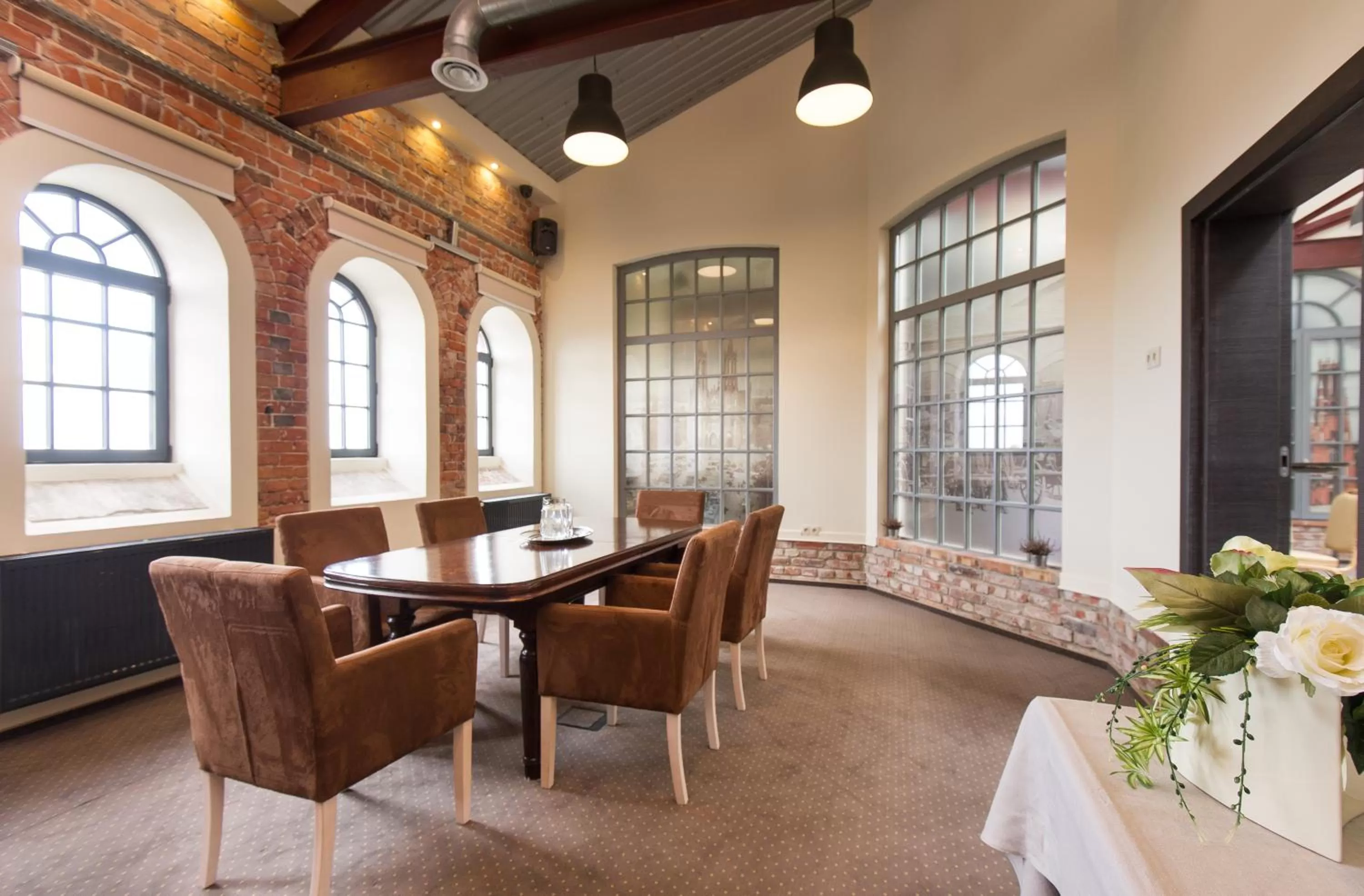 Seating area in Aparthotel Stara Przędzalnia
