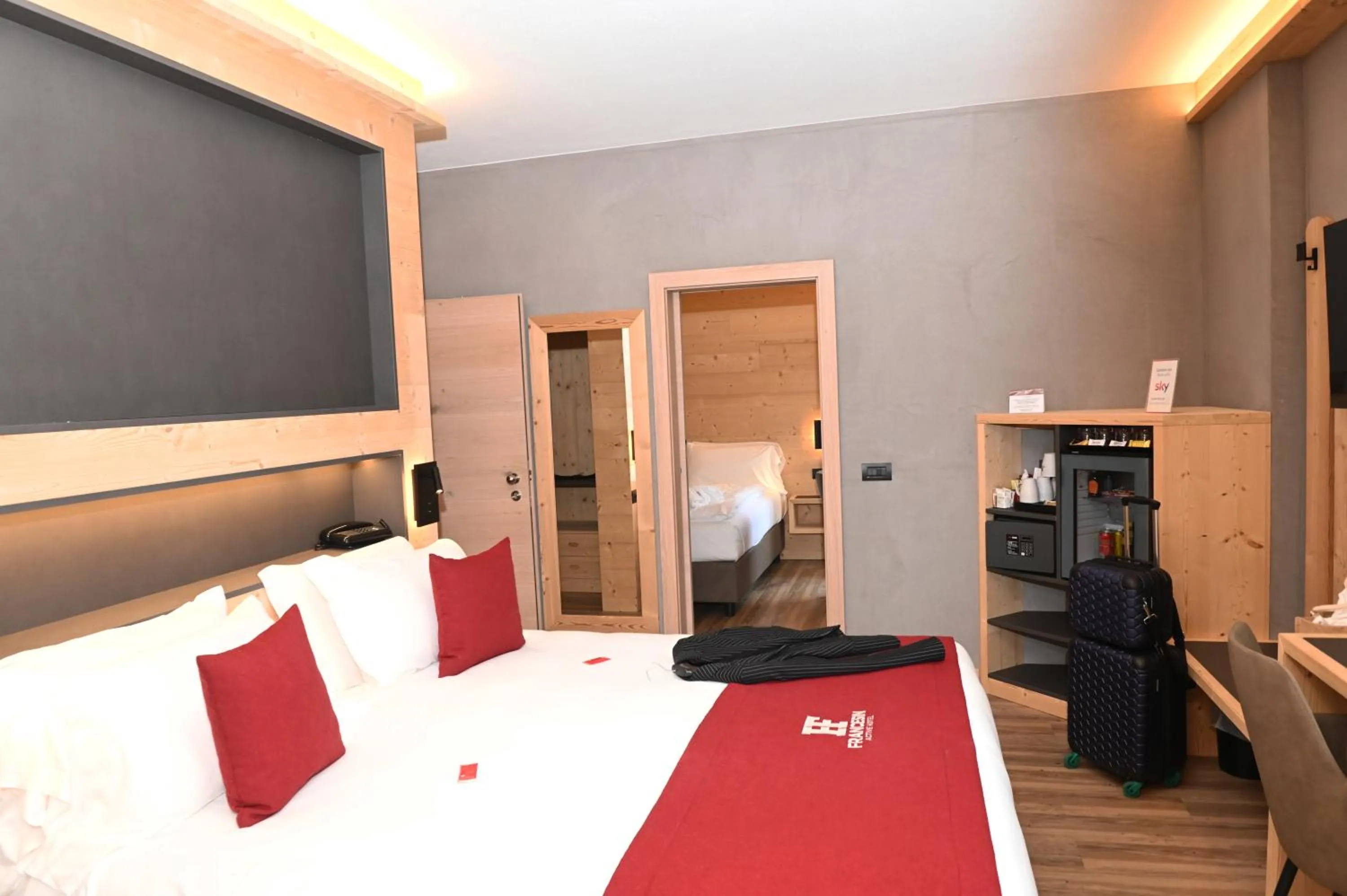 Bed in Francesin Active Hotel