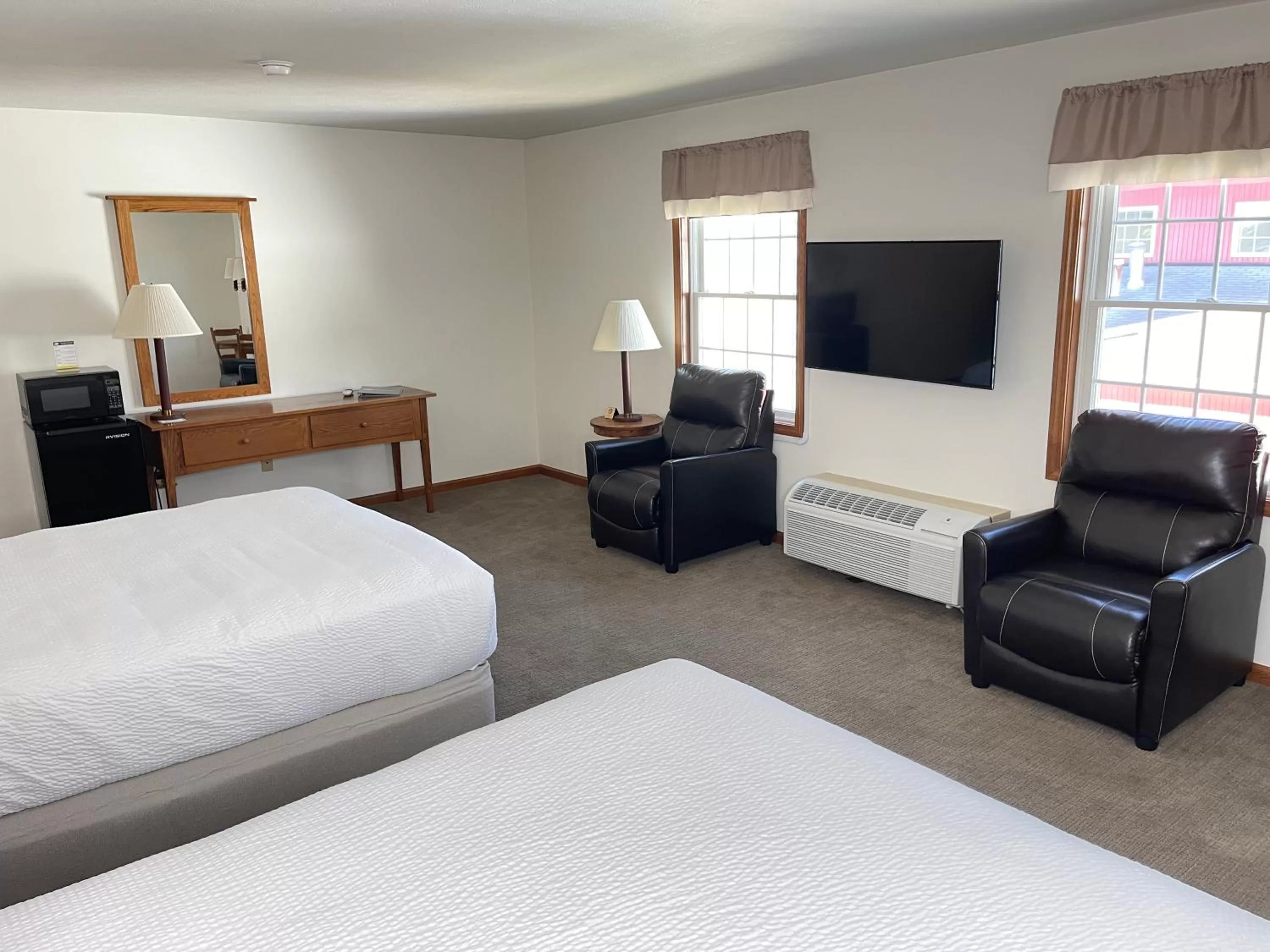 Bed in Farmstead Inn and Conference Center