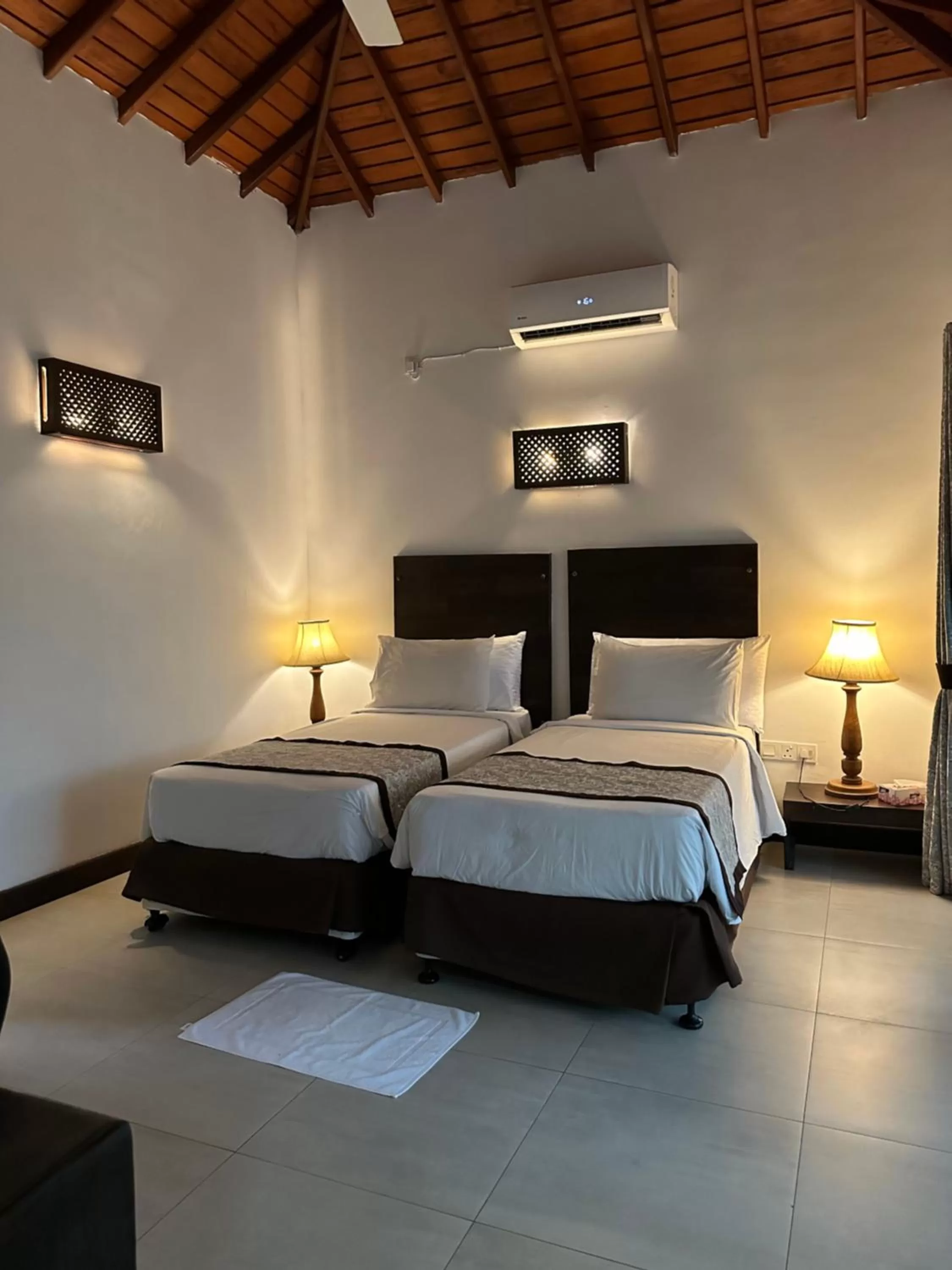 Photo of the whole room, Bed in Amaluna Resorts