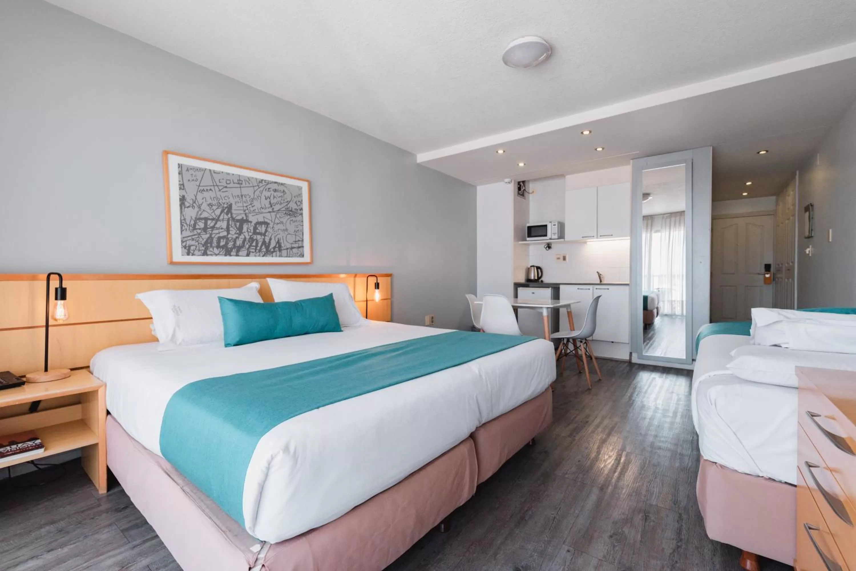 Photo of the whole room, Bed in Punta Trouville Hotel