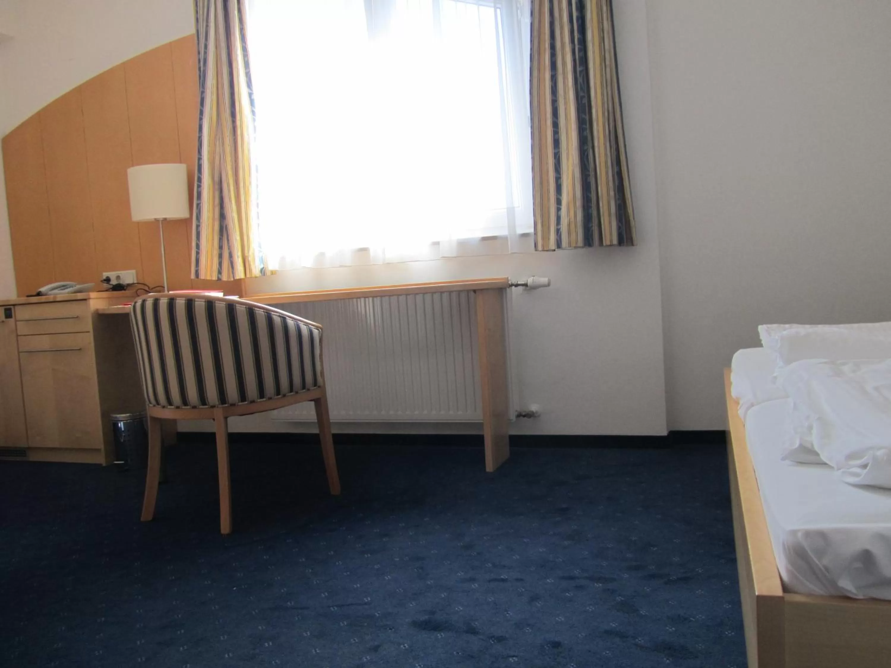 Seating area, Bed in Gastwirtschaft & Hotel Holzinger
