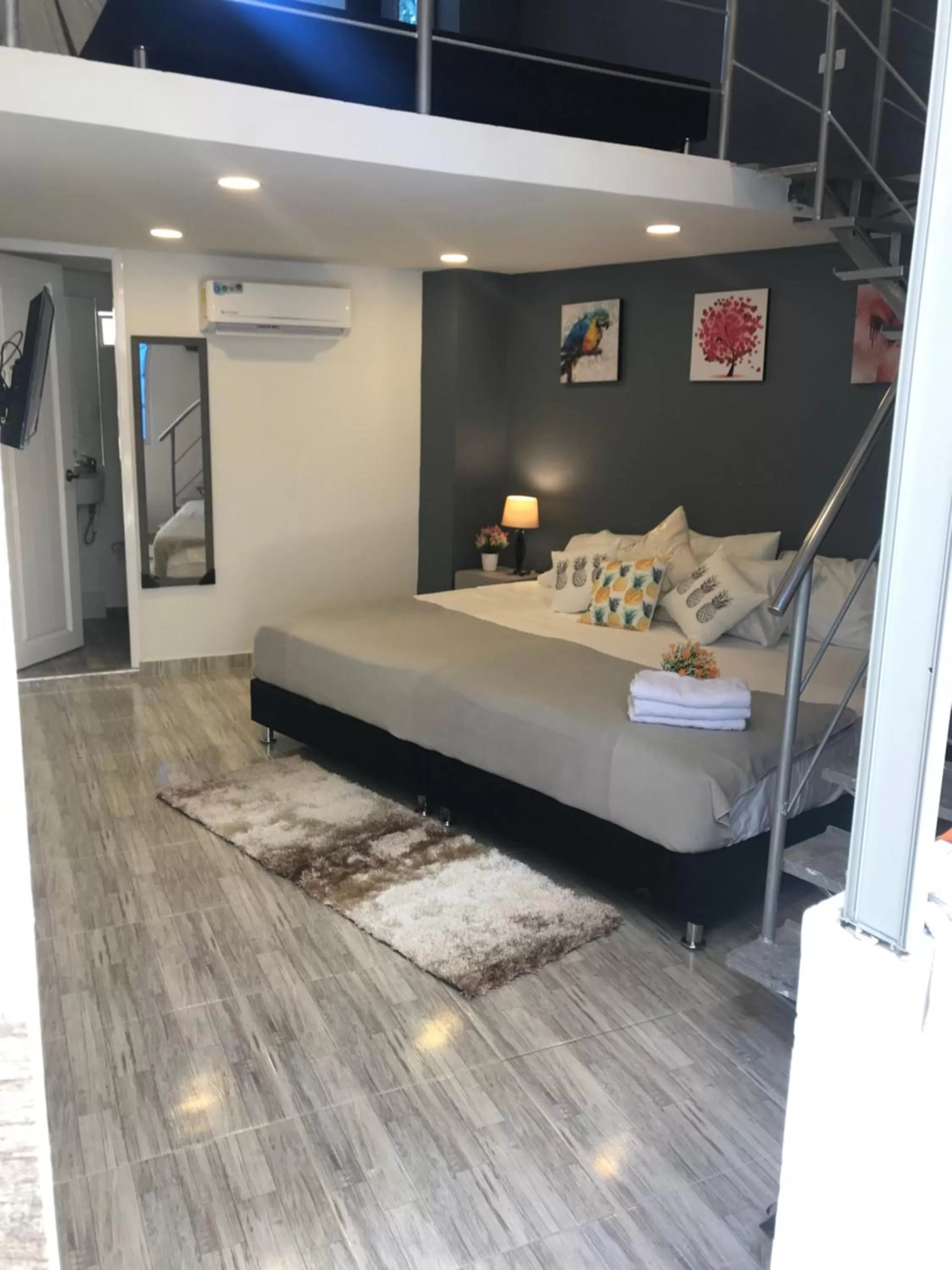 Bed in Bahia 79 Apartasuites Cerca al Centro