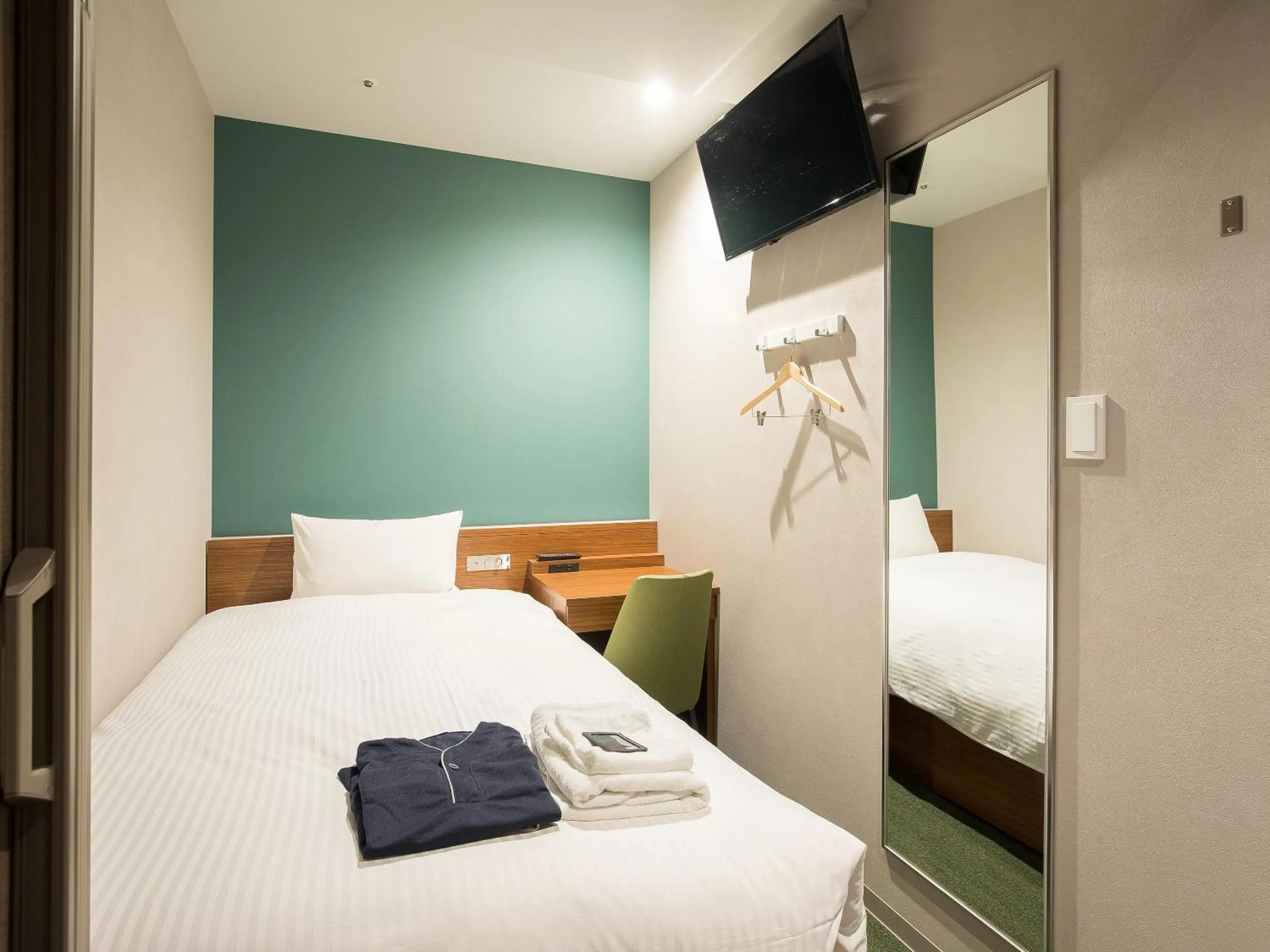 Bed in Gardens Cabin