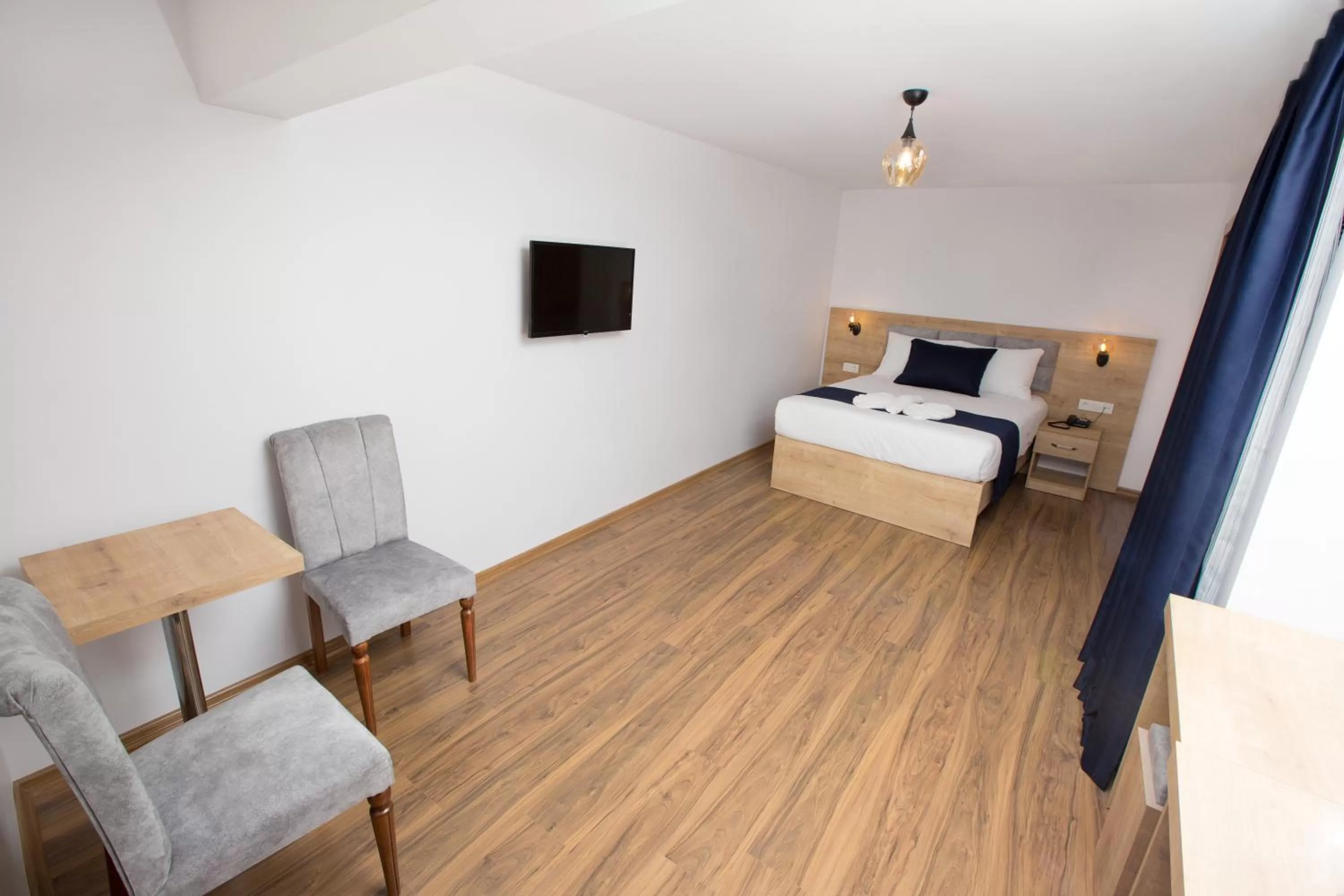 Dining area, Bed in Golden Street Hotel